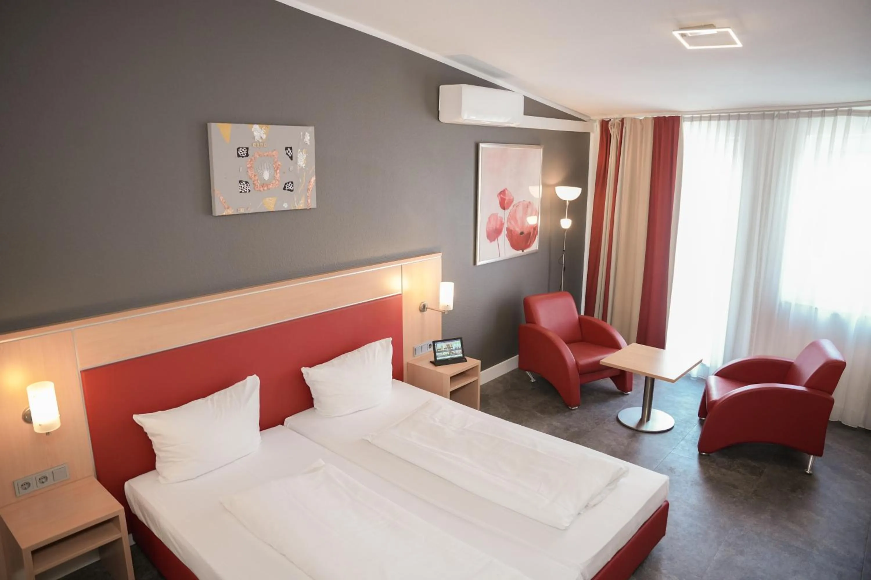 Bed in Hotel Offenbacher Hof