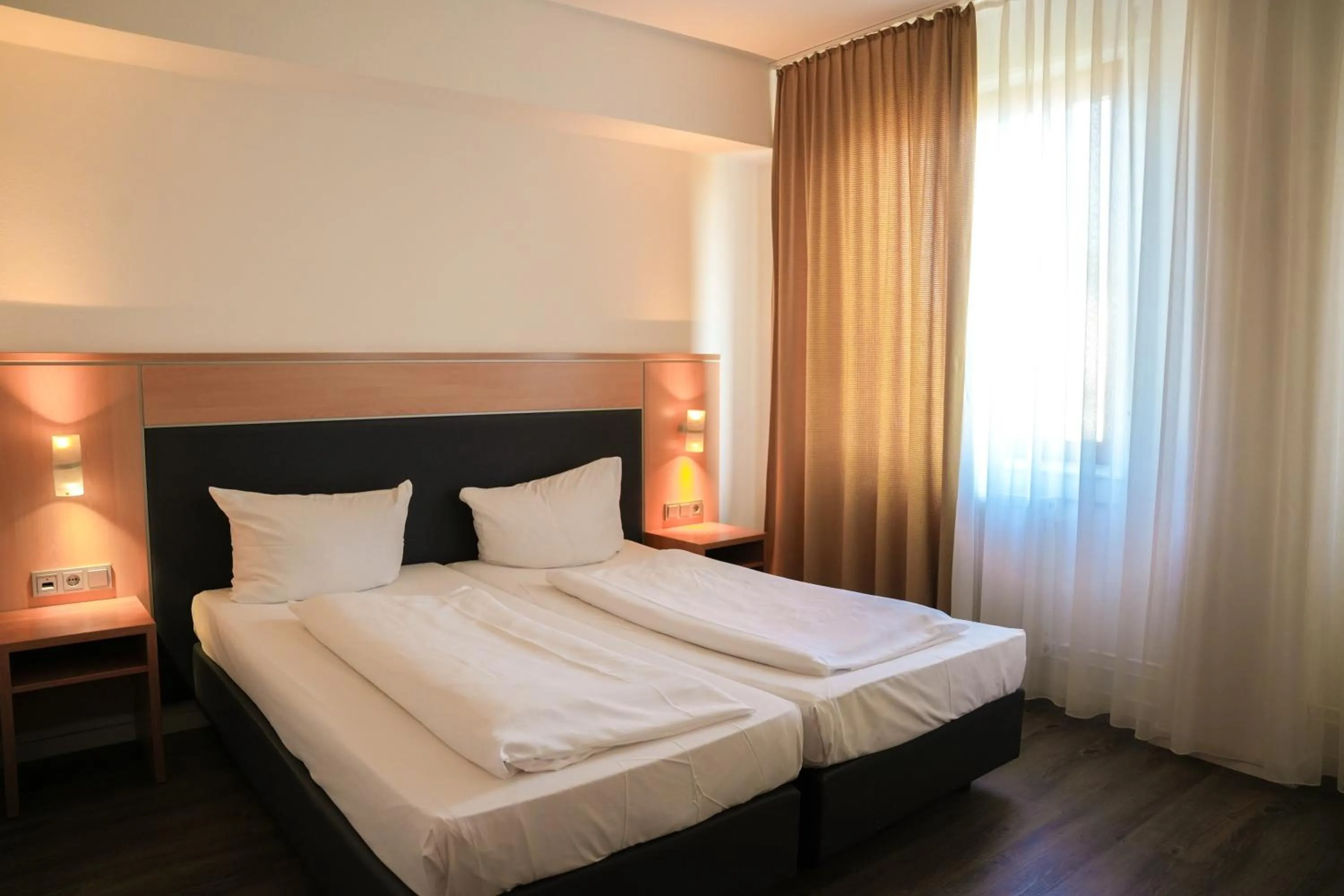 Bed in Hotel Offenbacher Hof