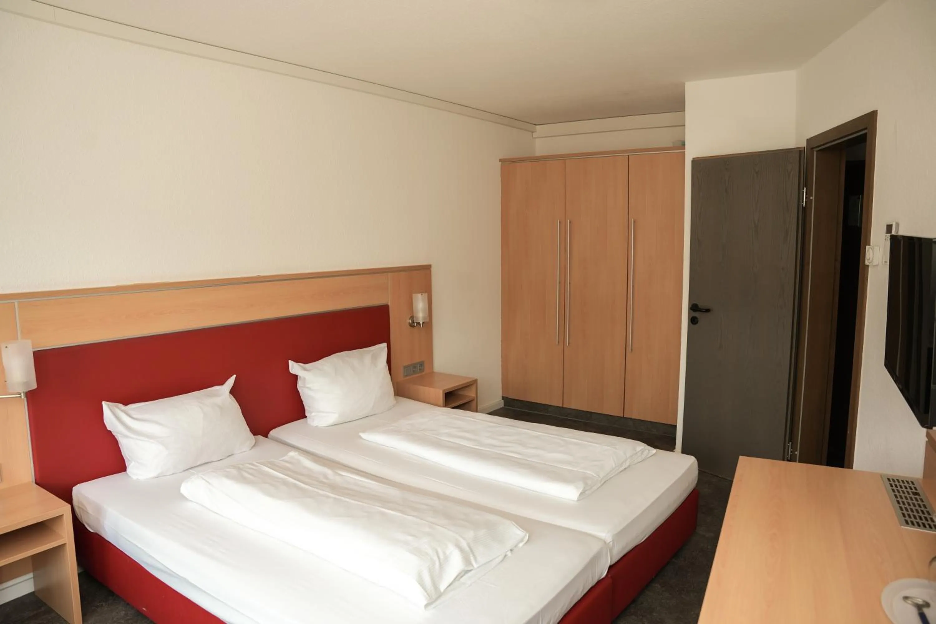 Bed in Hotel Offenbacher Hof