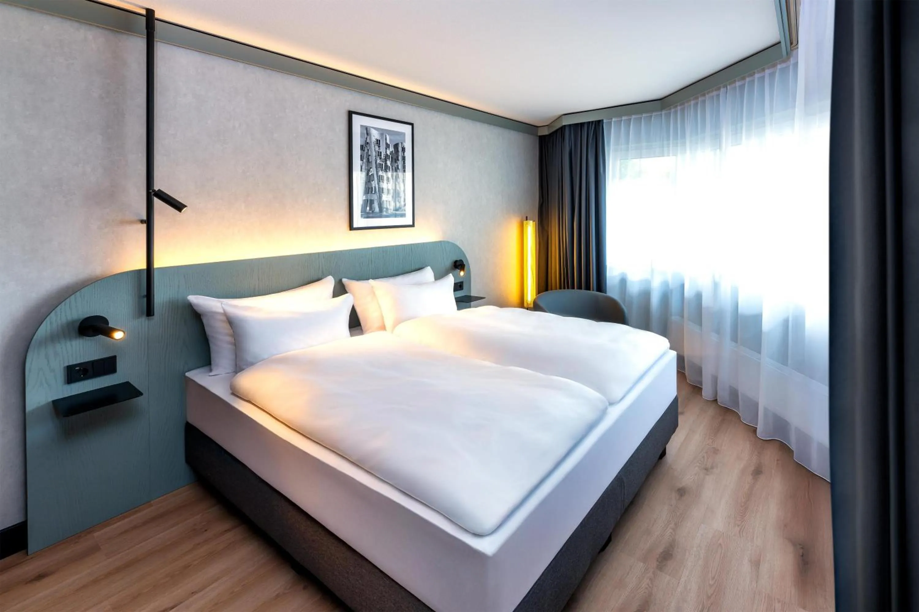 Bedroom, Bed in Radisson Hotel Dusseldorf City Center