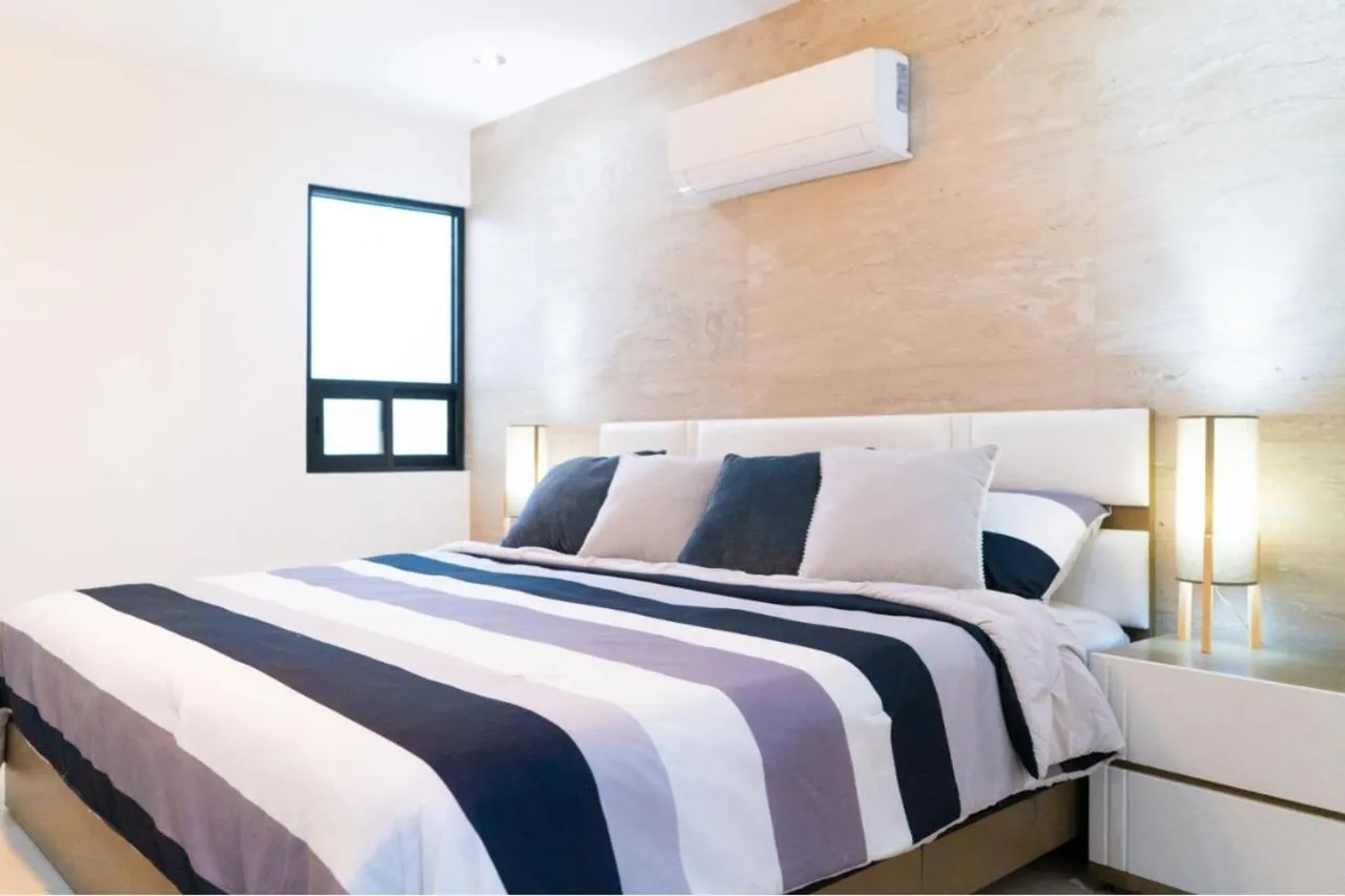 Bed in ECONOSUITES FUNDIDORA