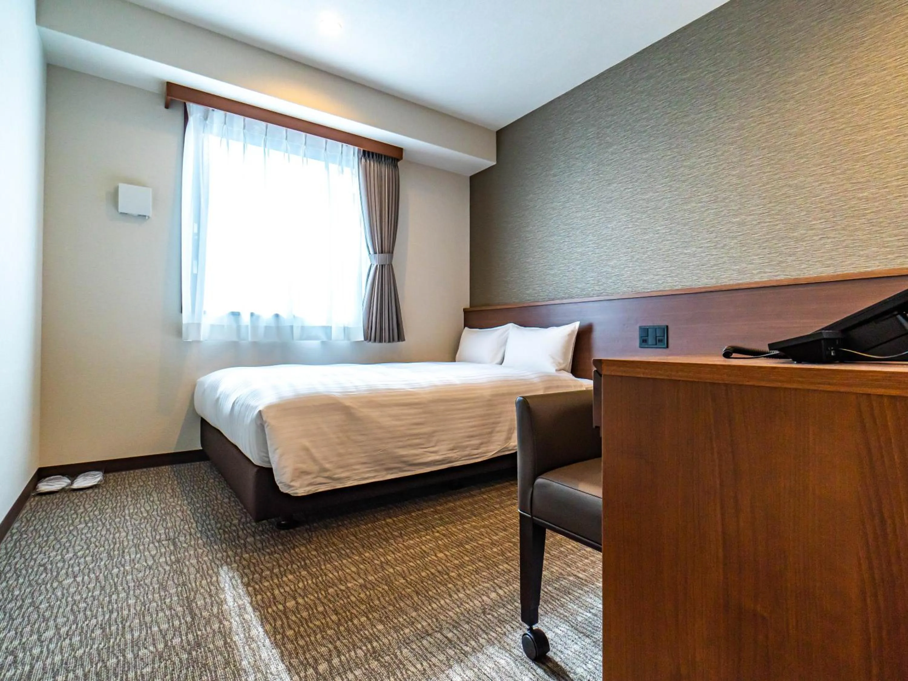 Bed in Bande Hotel Tenpozan Higashi