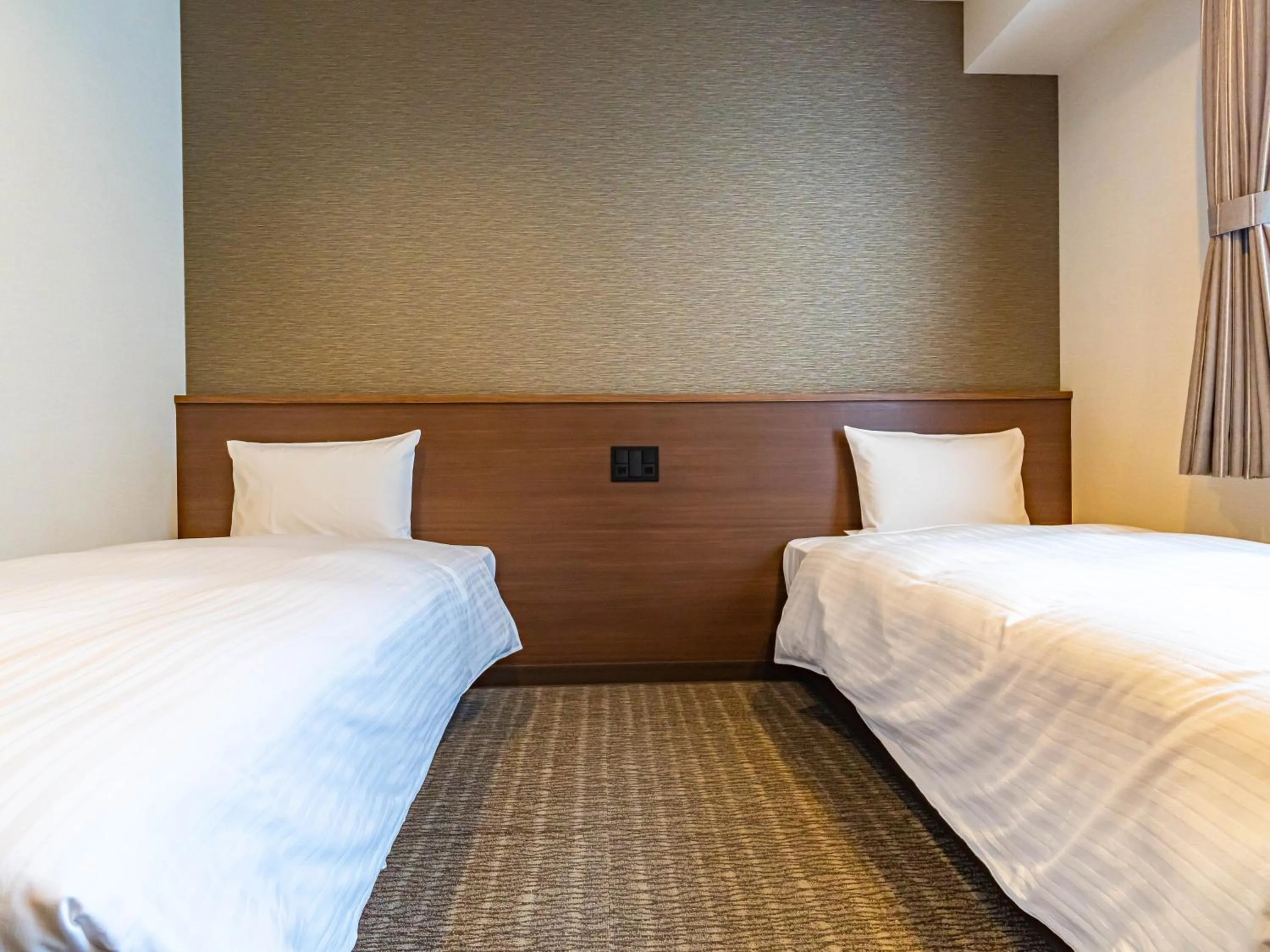 Bed in Bande Hotel Tenpozan Higashi