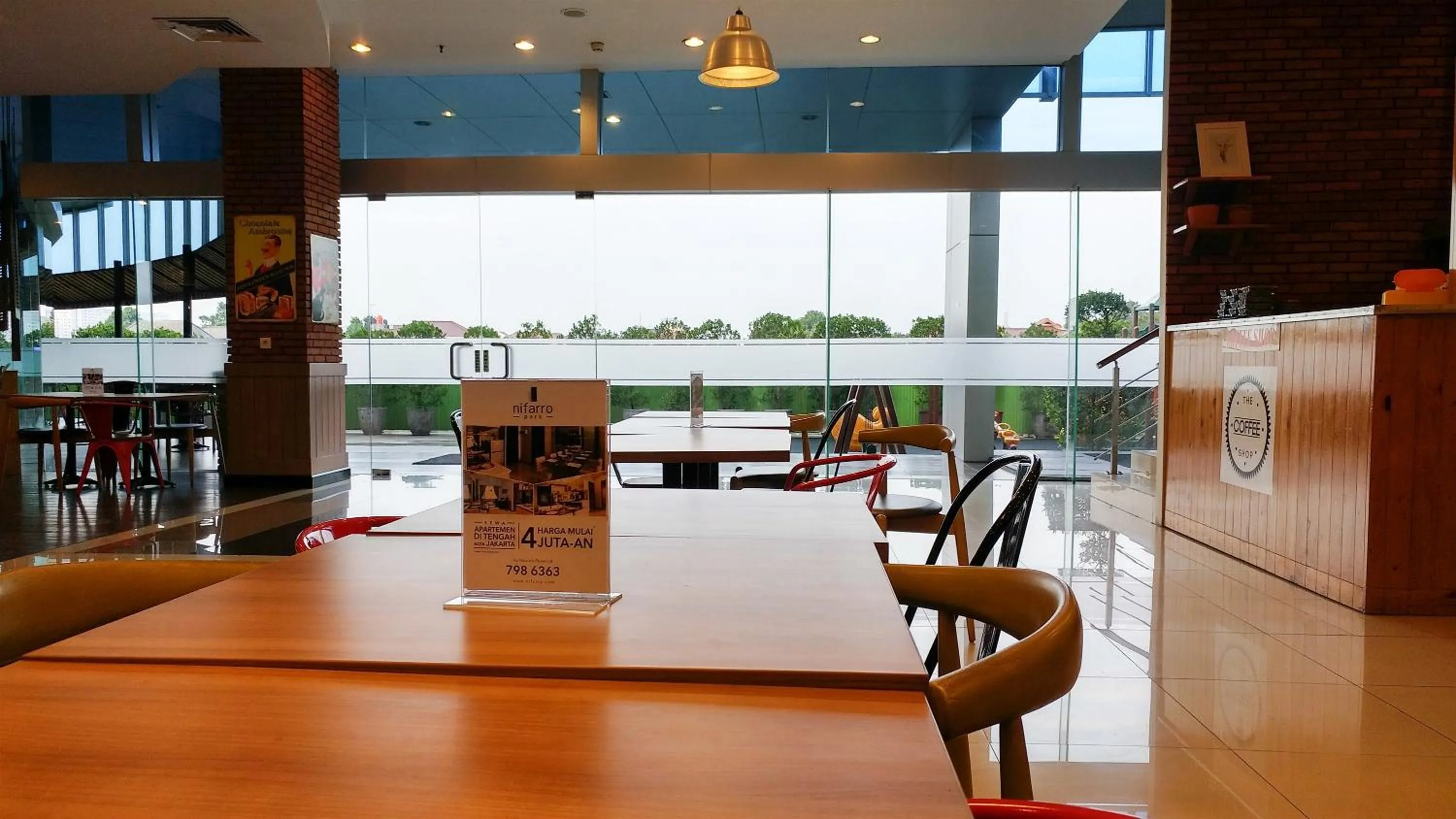 Lobby or reception in Vintage Studio Apartment at Nifarro Park By Travelio