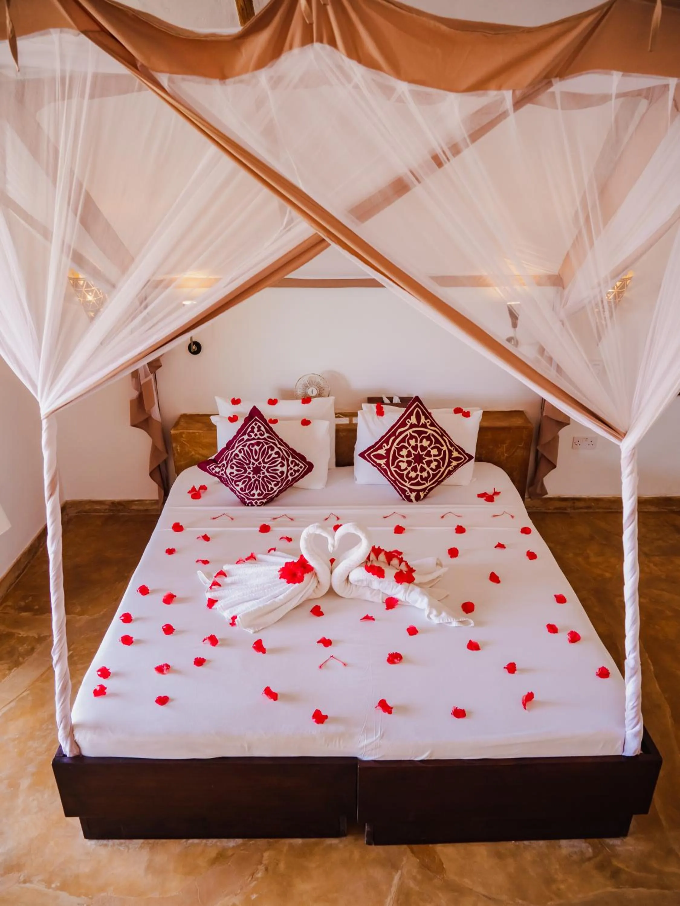 Bed in Sunshine Bay Hotel Zanzibar