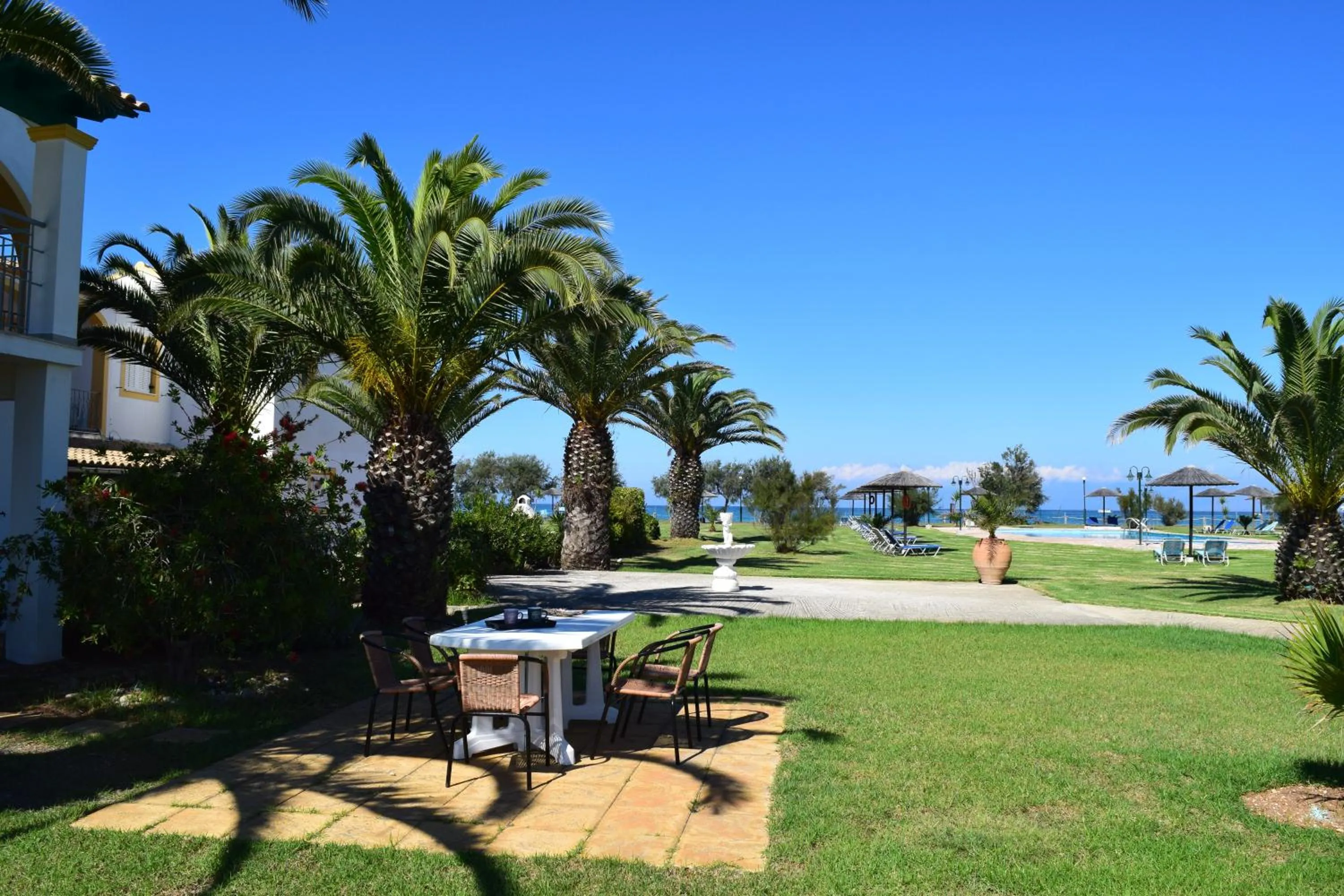 Garden in S&C Kosmos Beach Resort