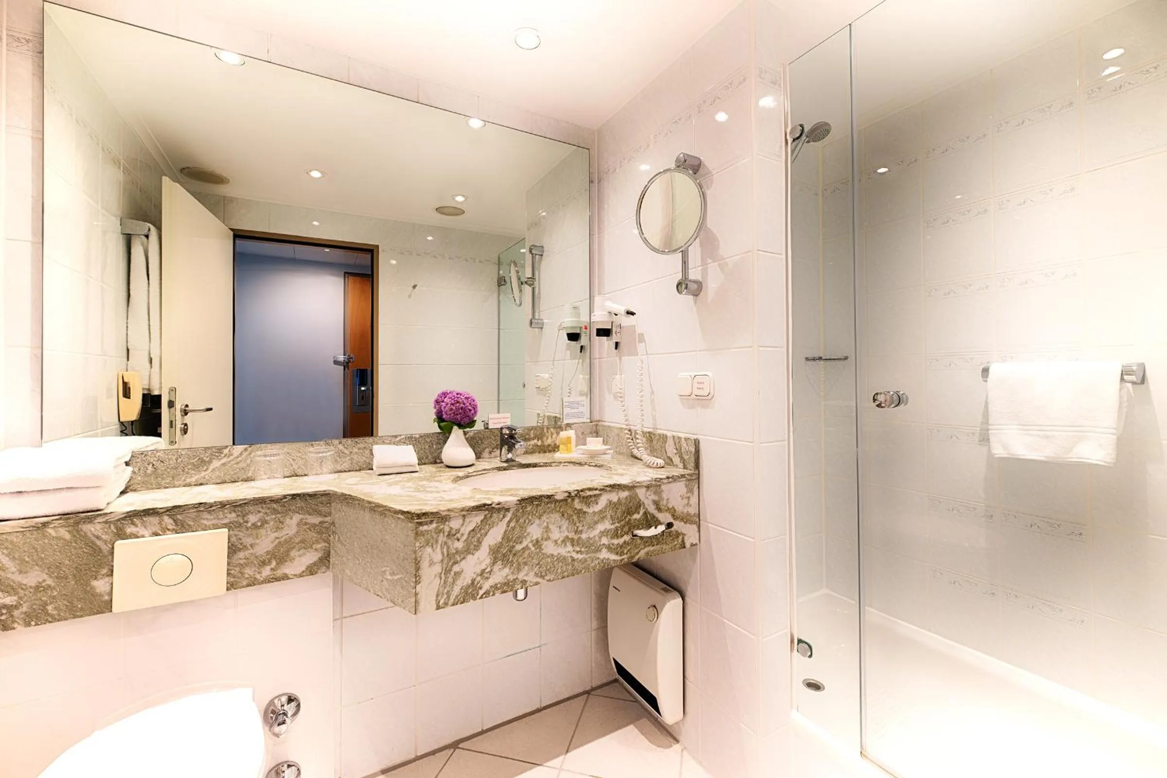 Bathroom in Crowne Plaza Frankfurt Congress Hotel by IHG