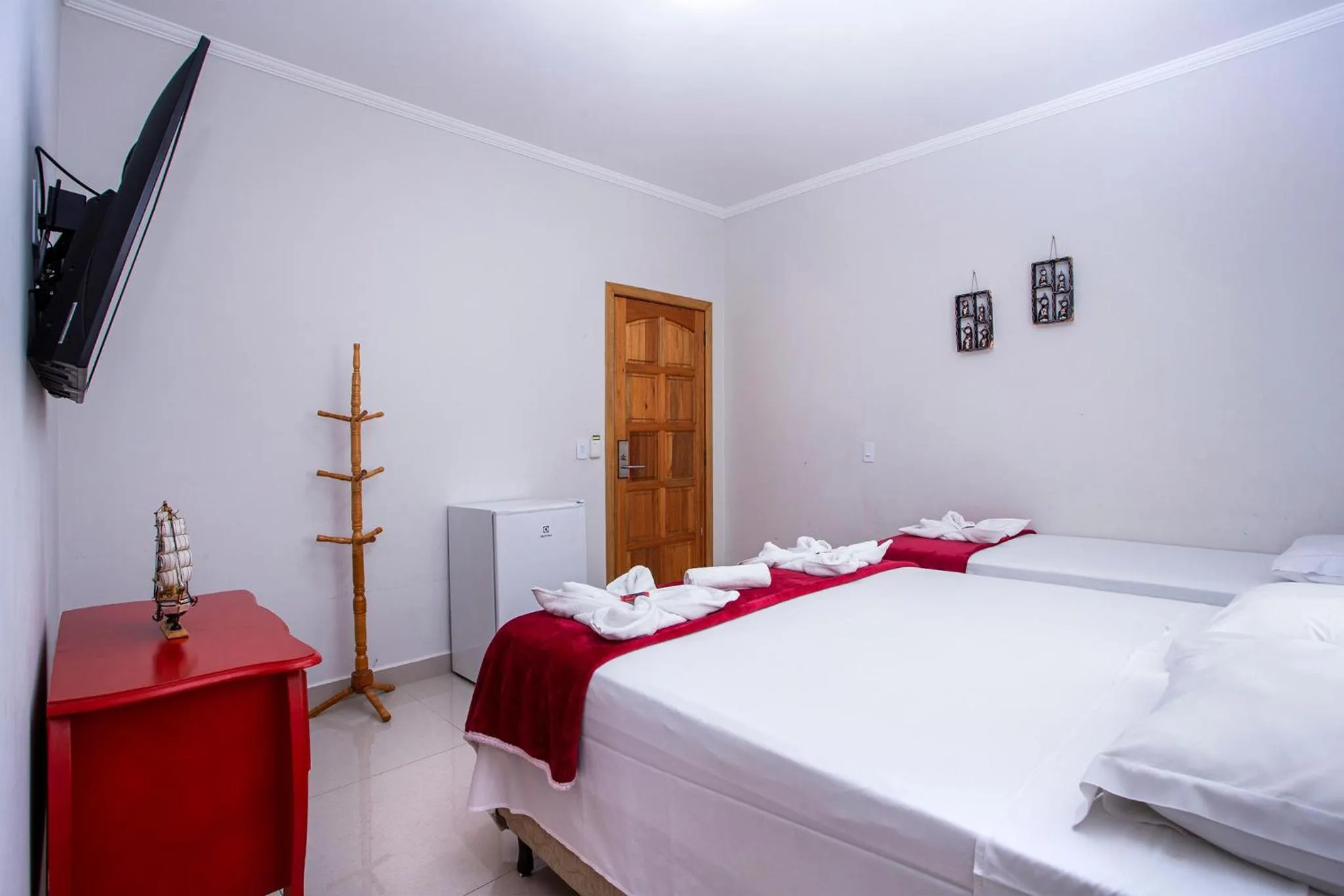 Bed in Pousada Guarubela Veloso