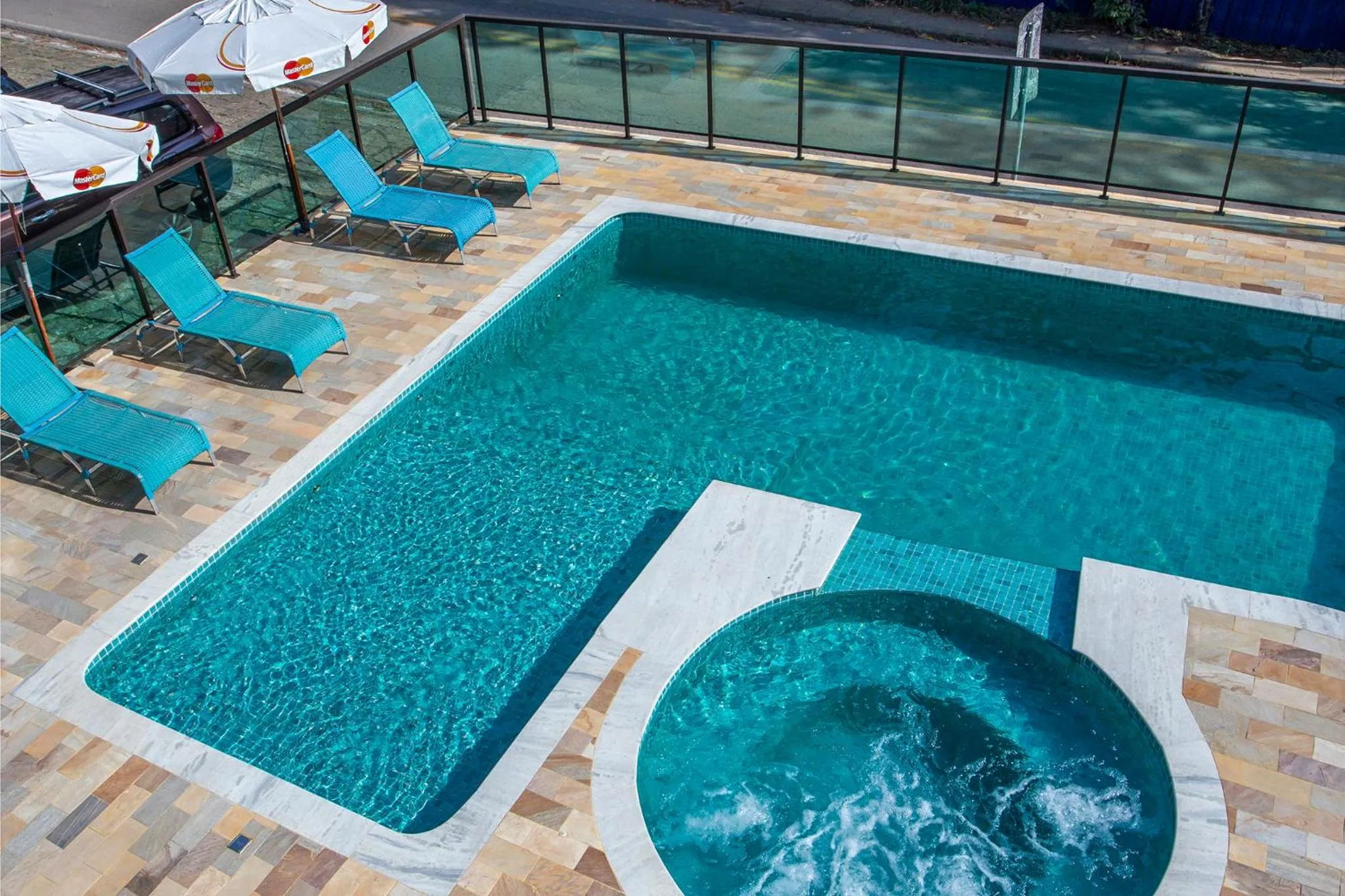 Swimming pool in Pousada Guarubela Veloso