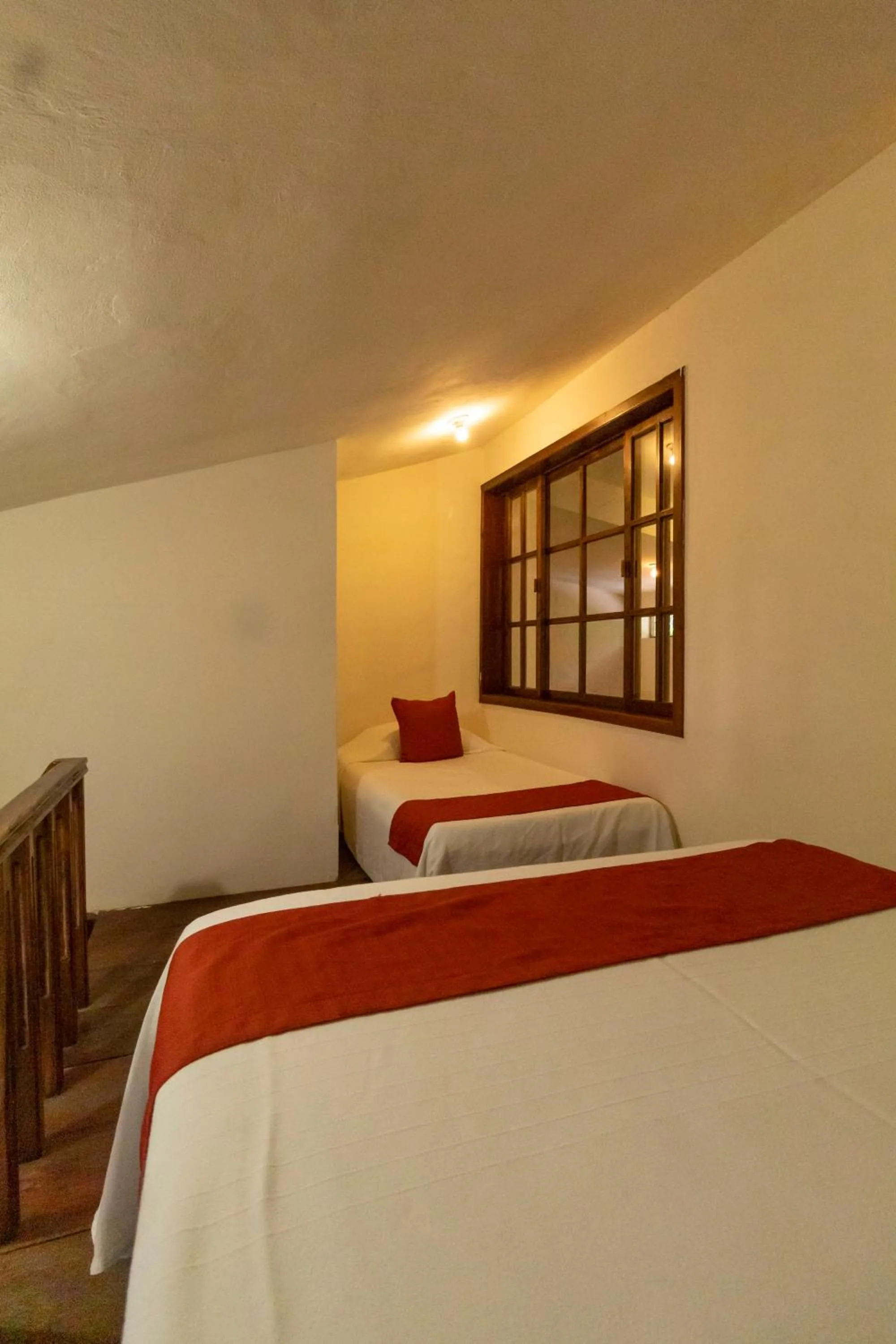 Bed in Hotel Maya Bell