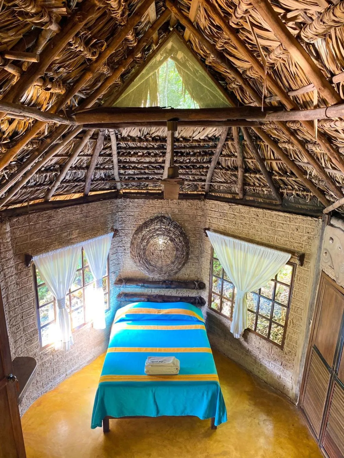 Bed in Hotel Maya Bell