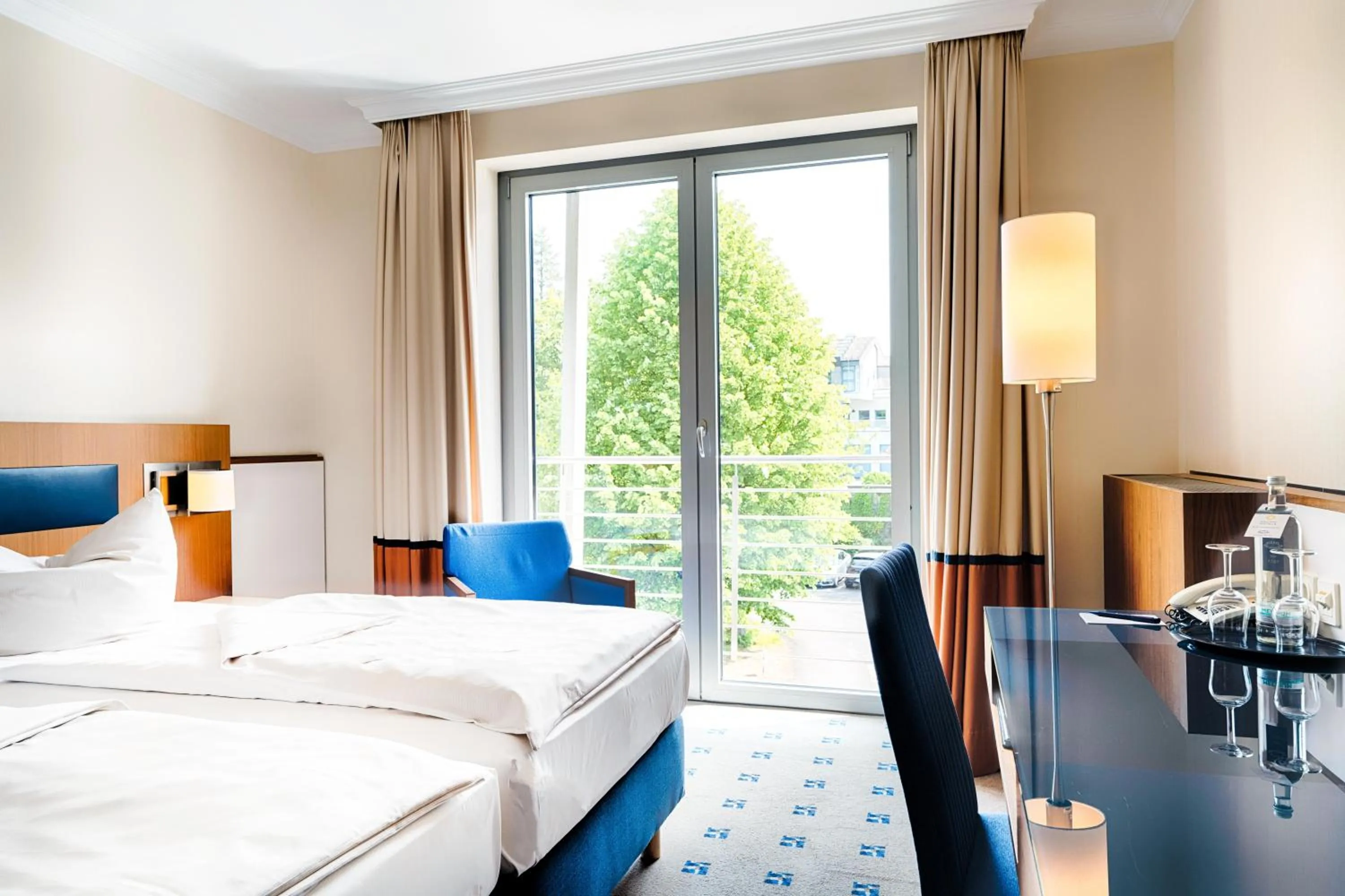 Photo of the whole room, Bed in Welcome Hotel Meschede Hennesee