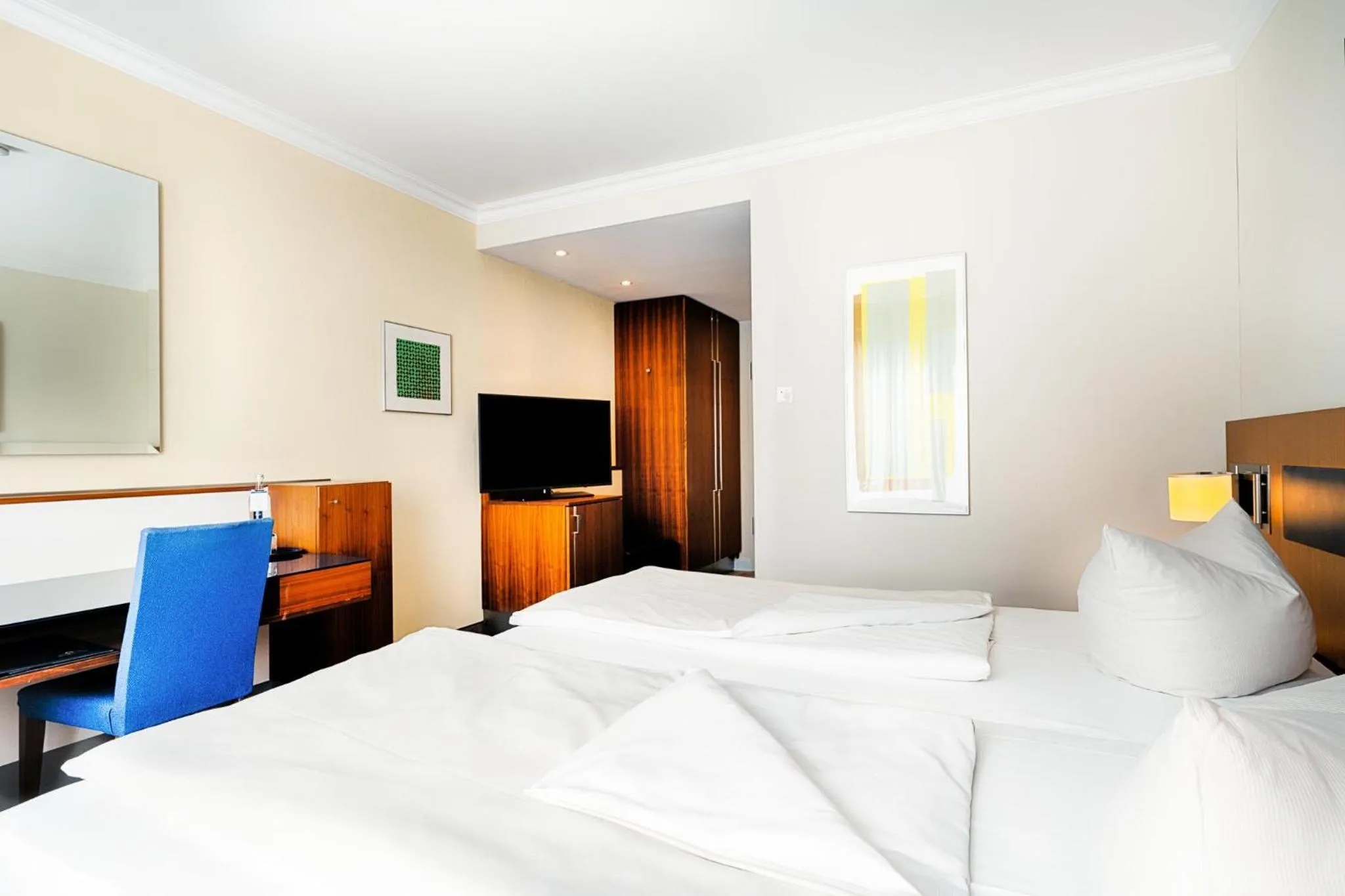 Photo of the whole room, Bed in Welcome Hotel Meschede Hennesee