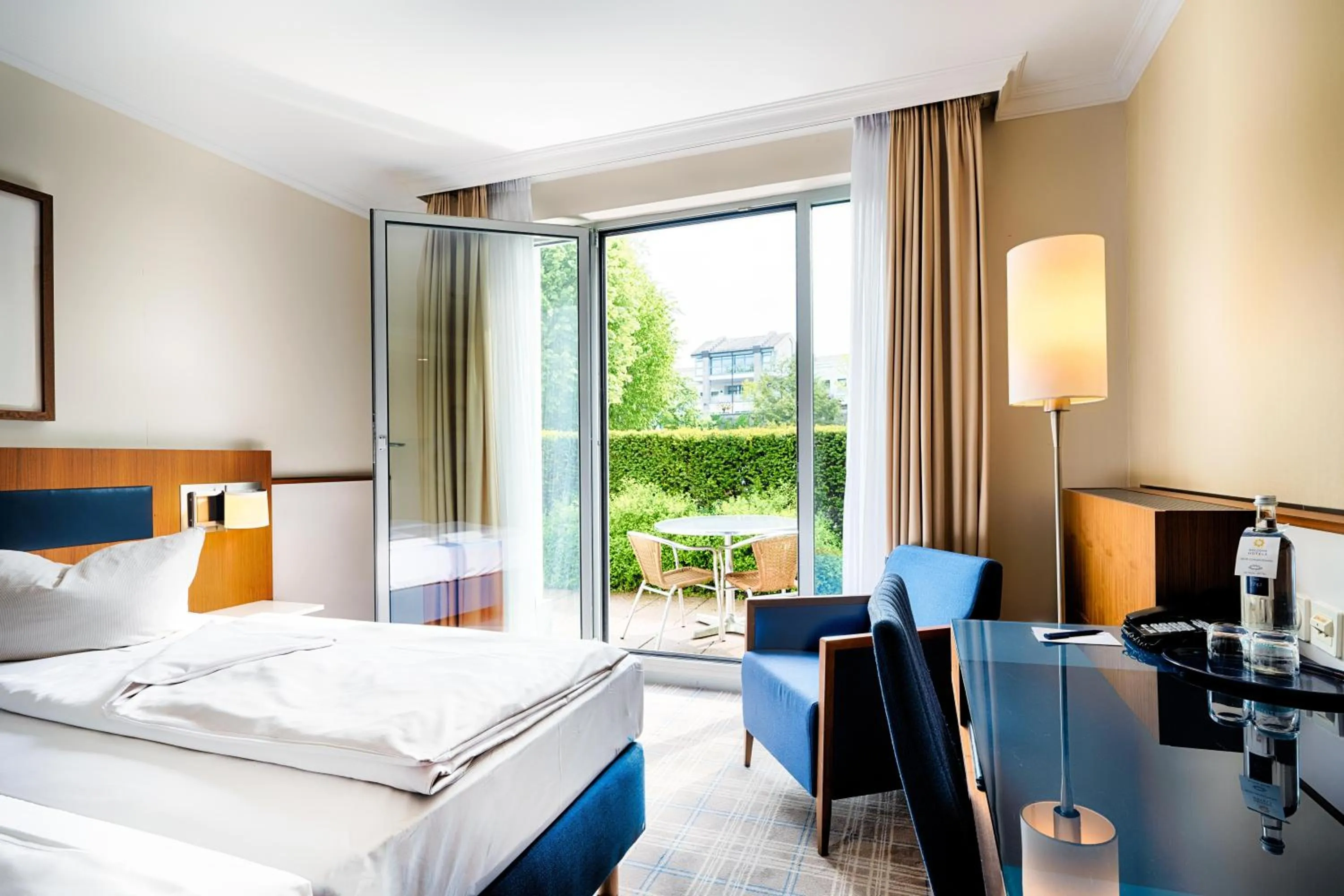 Photo of the whole room, Bed in Welcome Hotel Meschede Hennesee