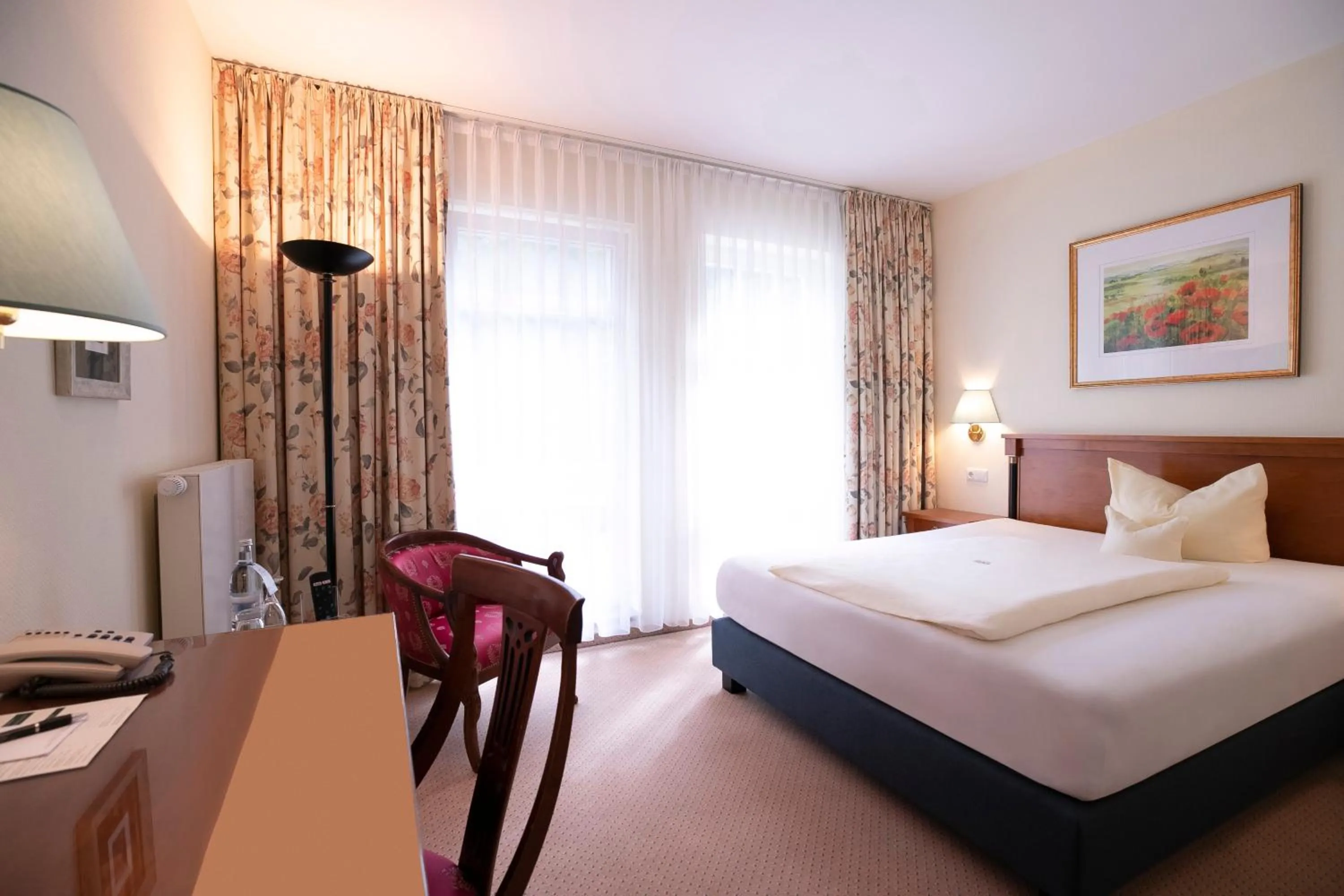 Photo of the whole room, Bed in Kurhaus am Inselsee