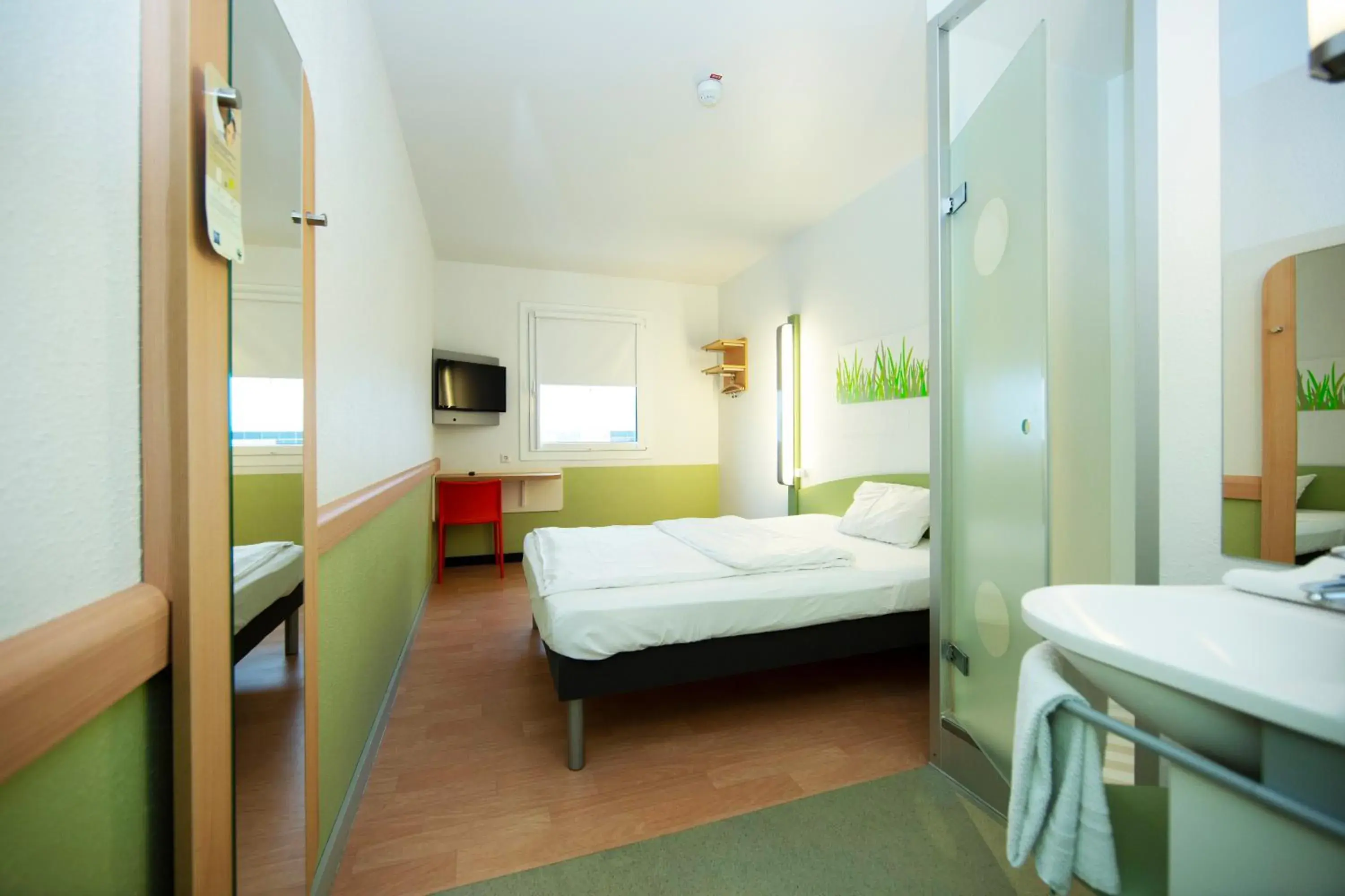 Photo of the whole room, Bed in ibis budget Flensburg Handewitt Photo of the whole room, Bed in ibis budget Flensburg Handewitt