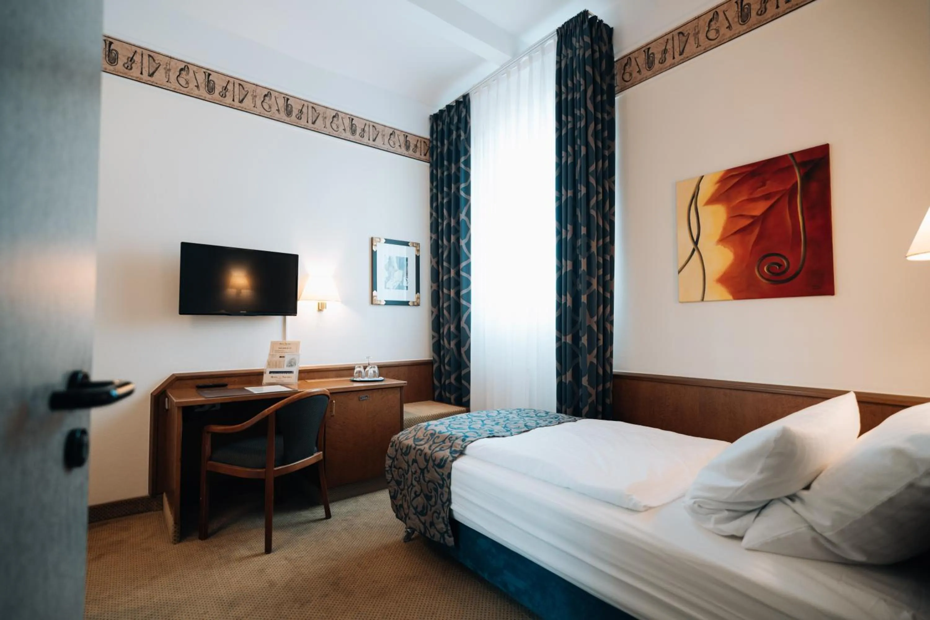 Bed in Hotel Viktoria