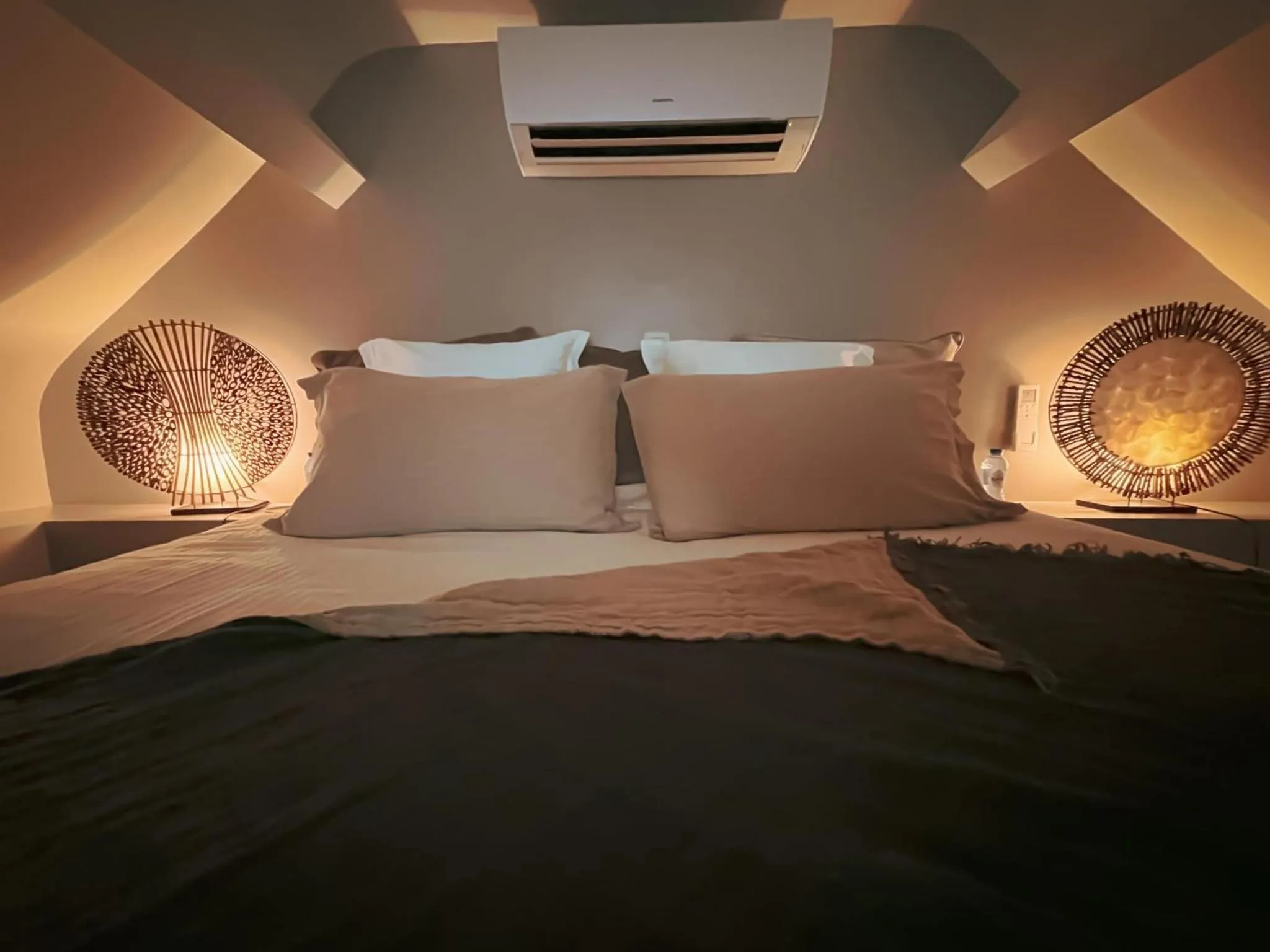 Bed in Le Jardin Des Secrets "Gites et chambres à louer"