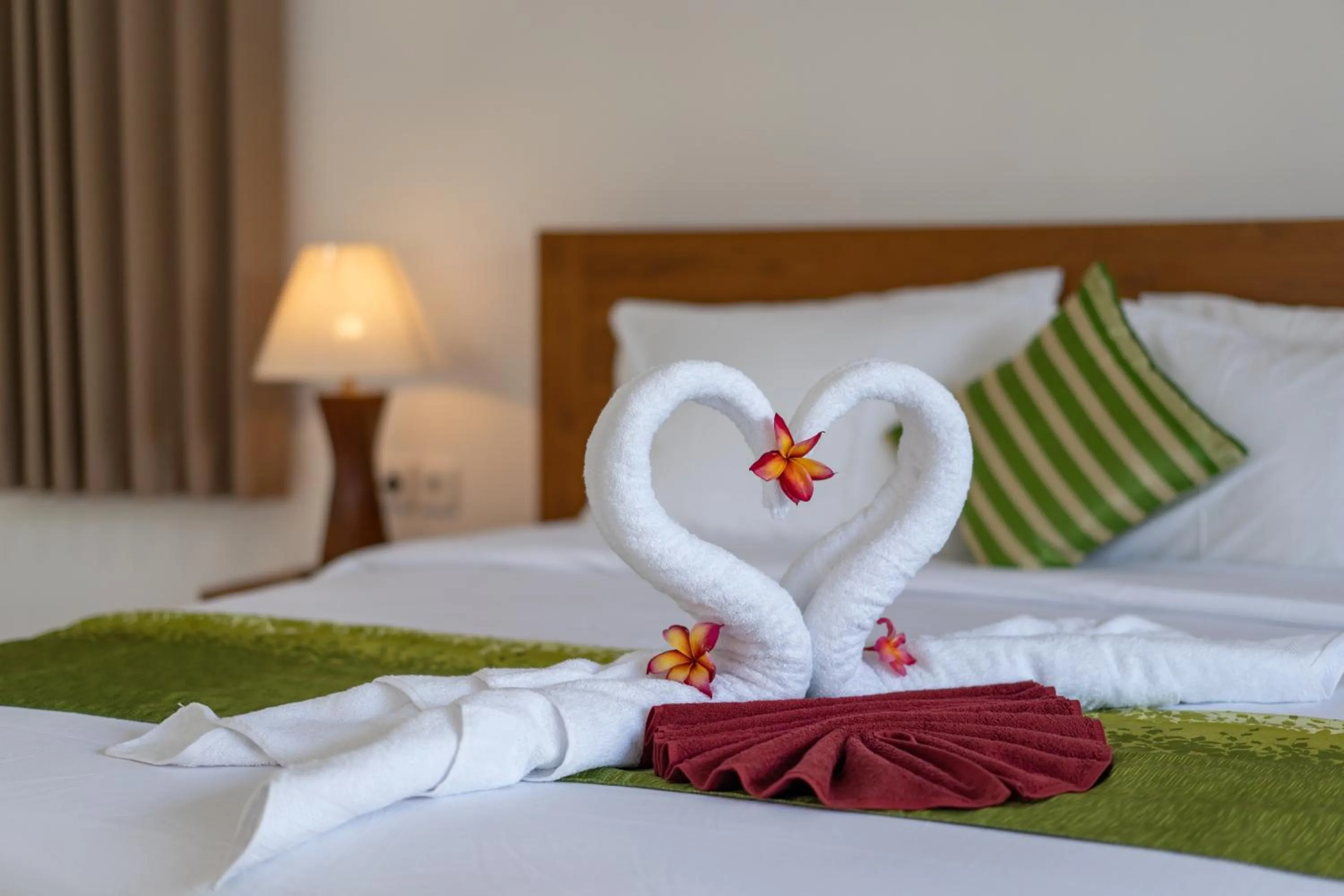 Bed in Nusa Indah Onai Hotel