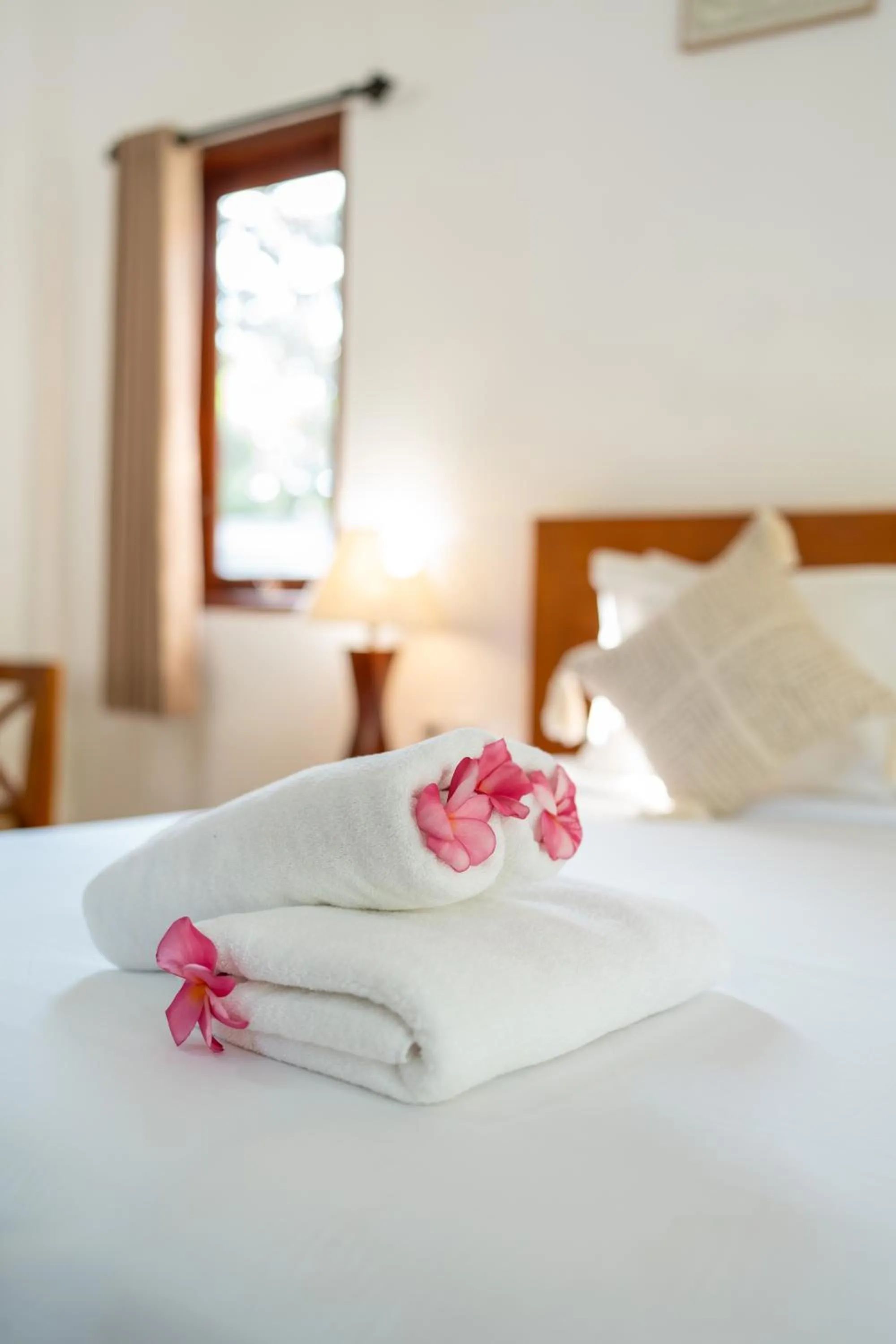 Bed in Nusa Indah Onai Hotel