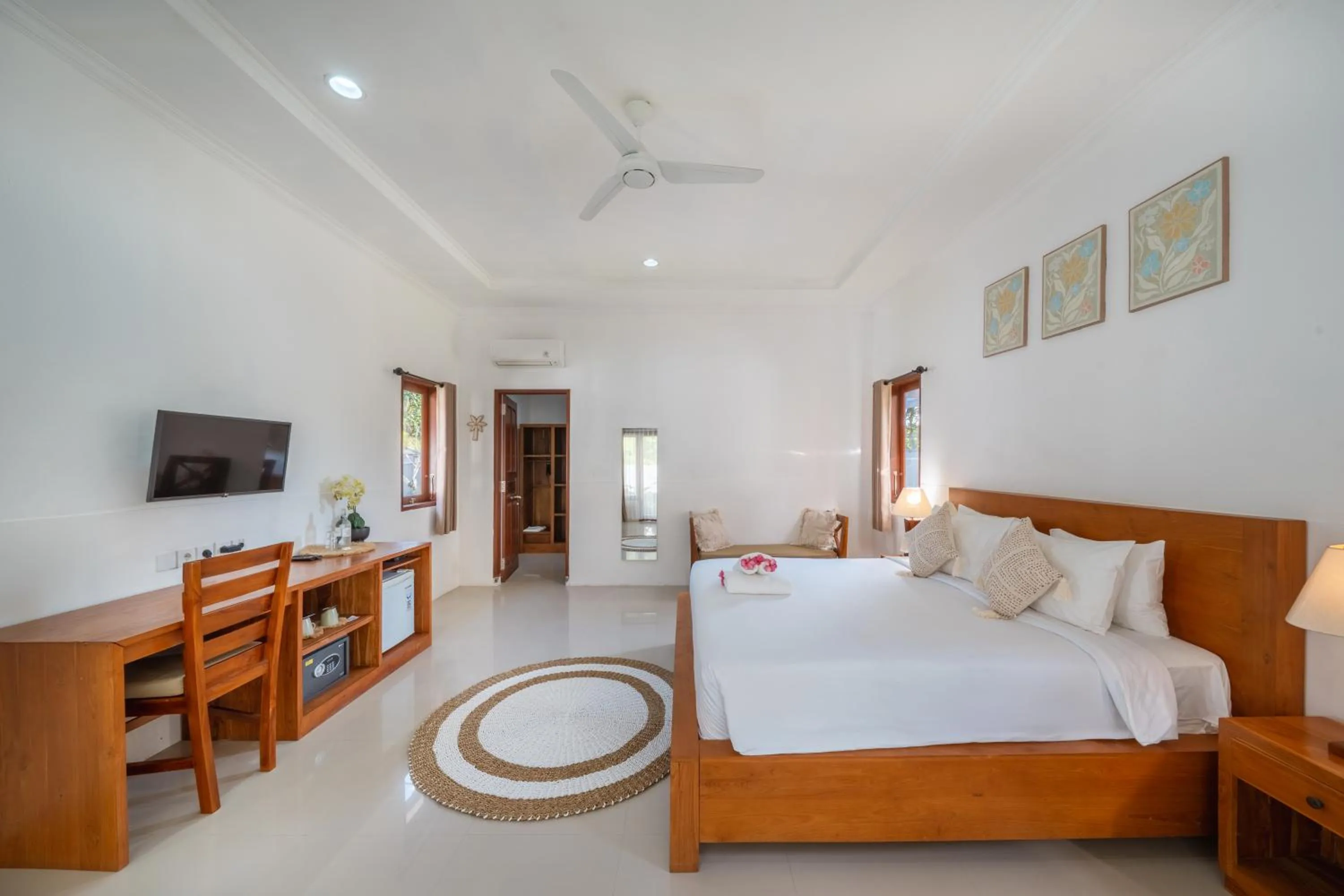 Bed in Nusa Indah Onai Hotel