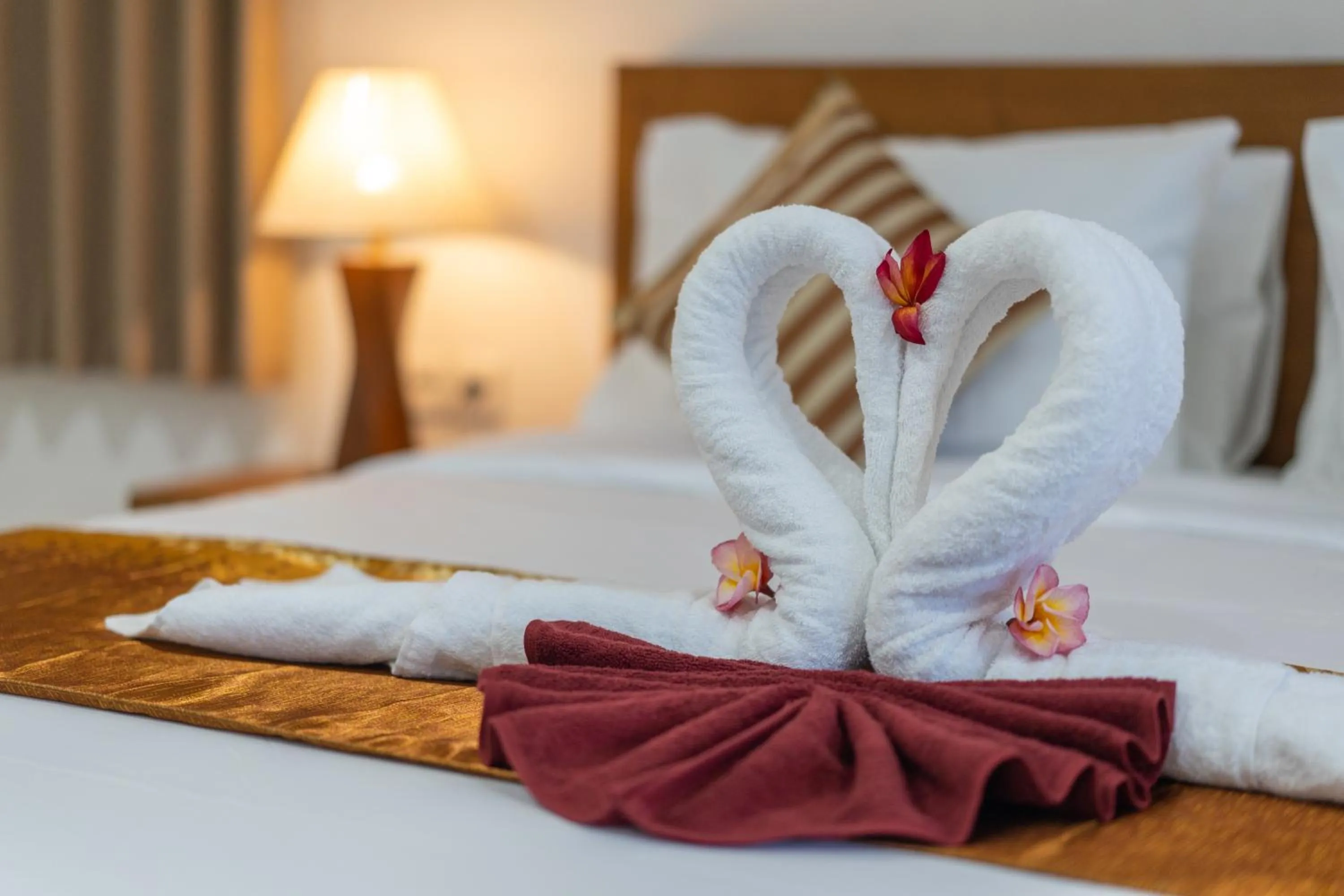 Bed in Nusa Indah Onai Hotel