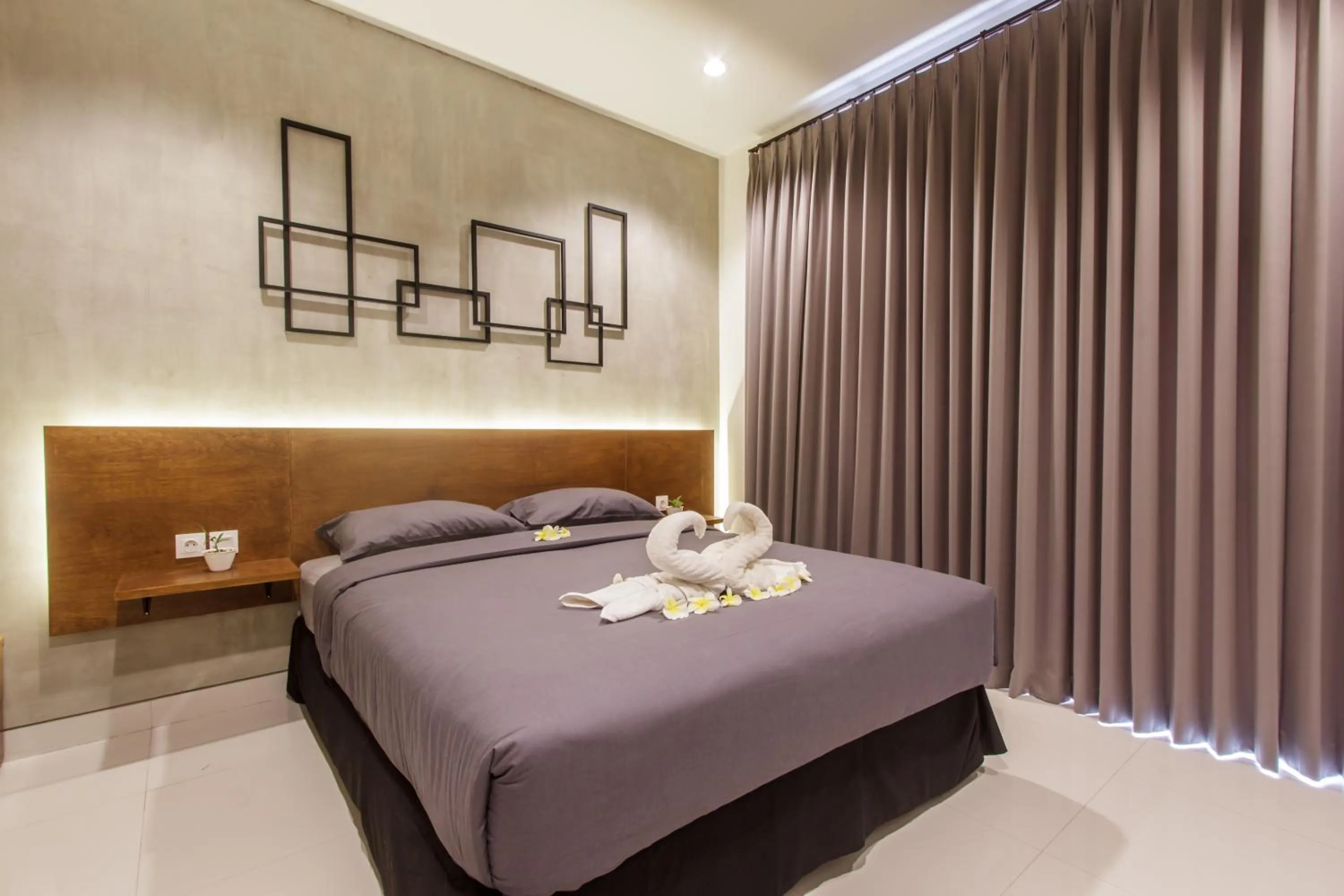 Bed in The jero 18 kuta guest house