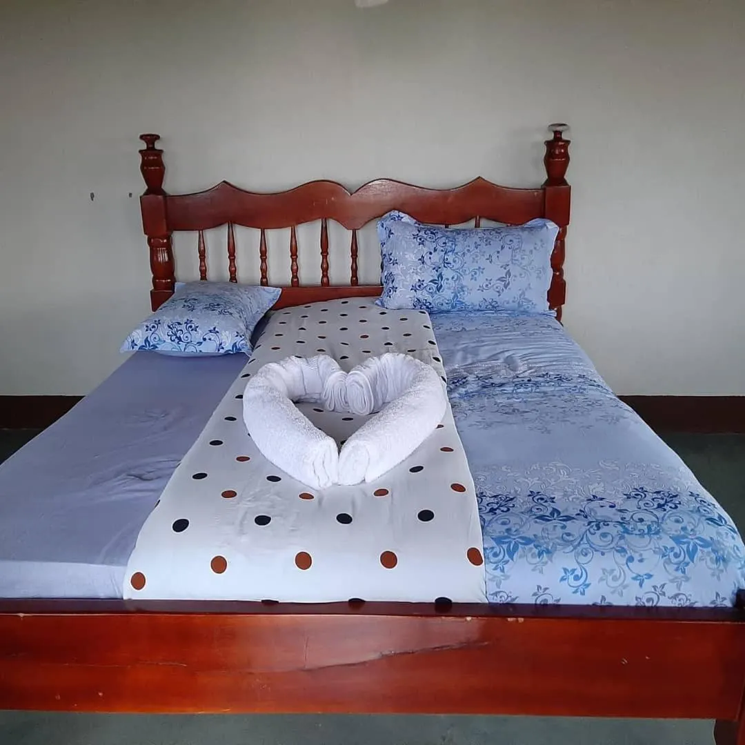 Photo of the whole room, Bed in Tangi Safari Lodge