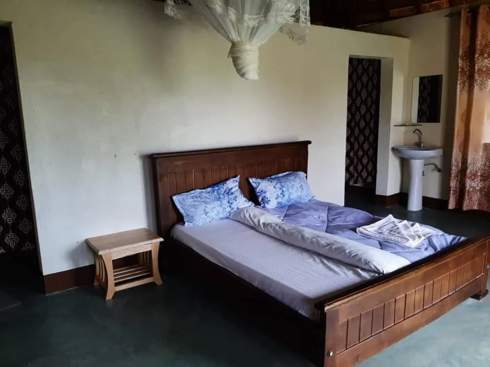 Bed in Tangi Safari Lodge