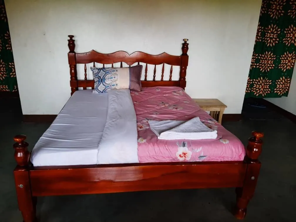 Photo of the whole room, Bed in Tangi Safari Lodge