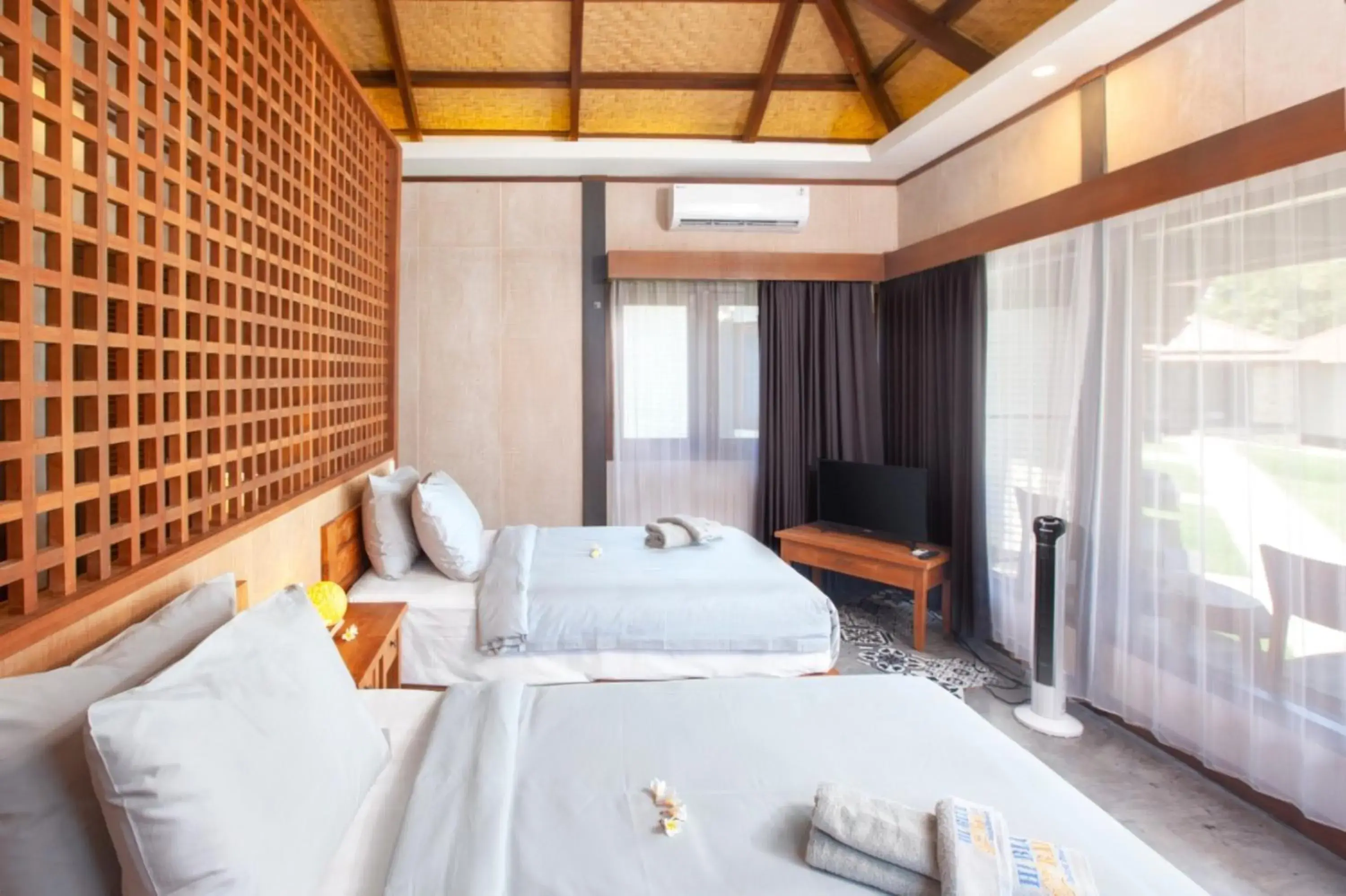 Living room, Bed in Hi Blue Bali Melasti Dive Resort Living room, Bed in Hi Blue Bali Melasti Dive Resort