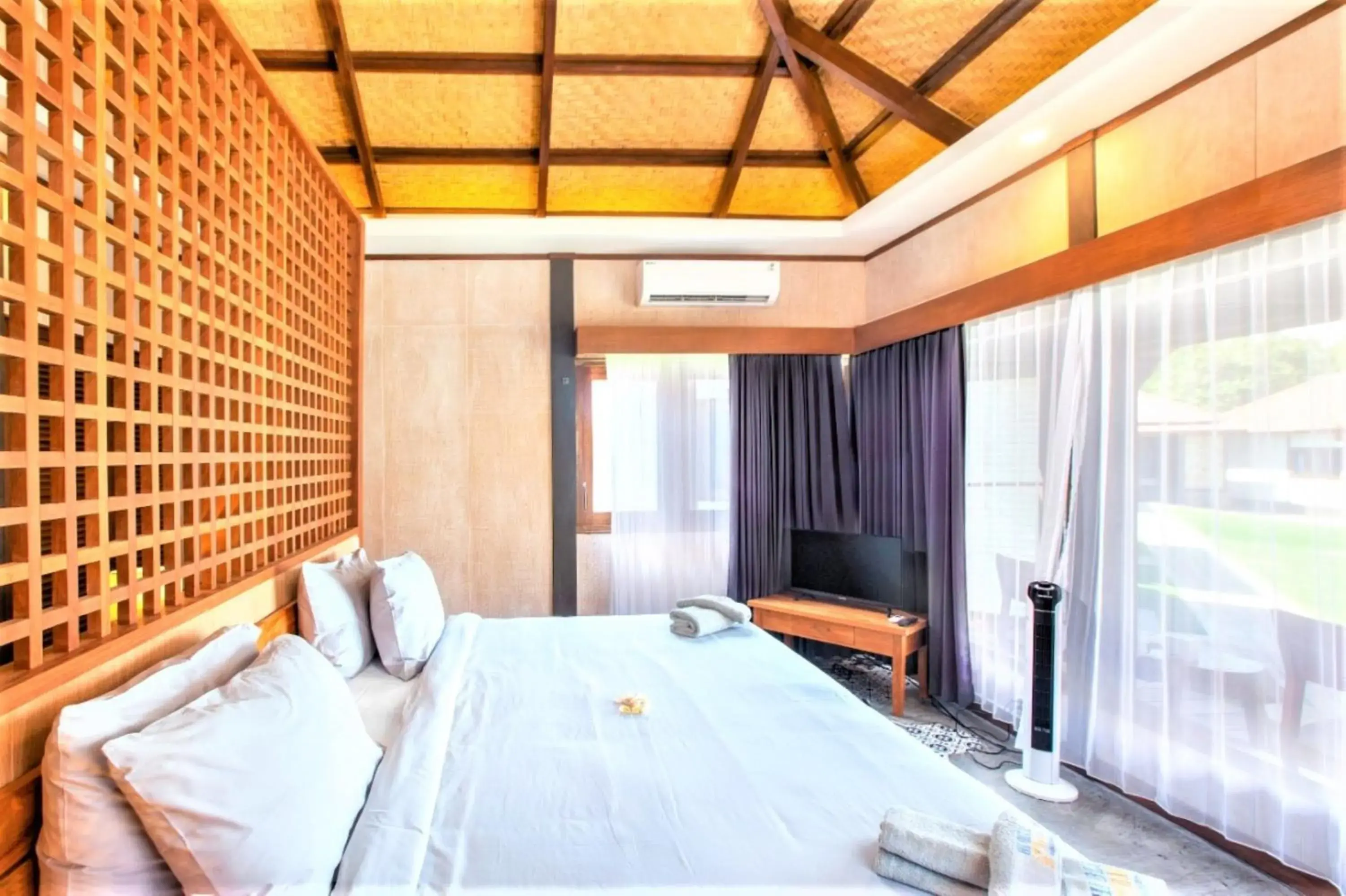 Bedroom, Bed in Hi Blue Bali Melasti Dive Resort Bedroom, Bed in Hi Blue Bali Melasti Dive Resort