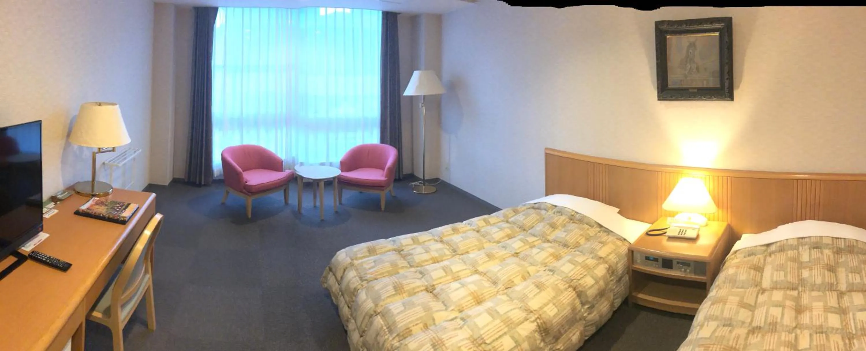 Bed in The Gran Resort Arima