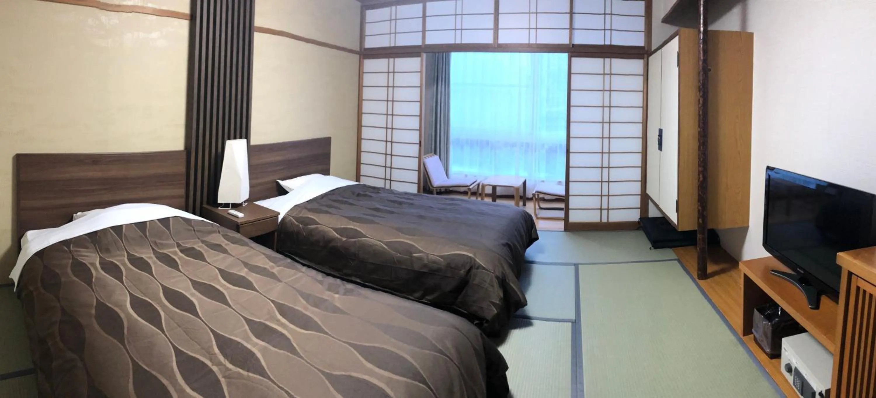 Bed in The Gran Resort Arima