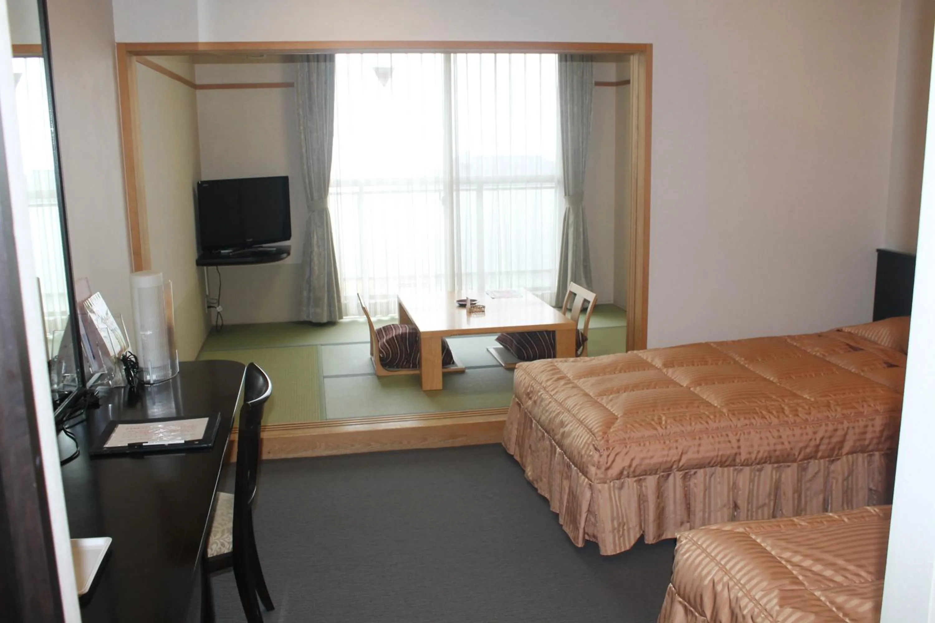 Bed in The Gran Resort Arima