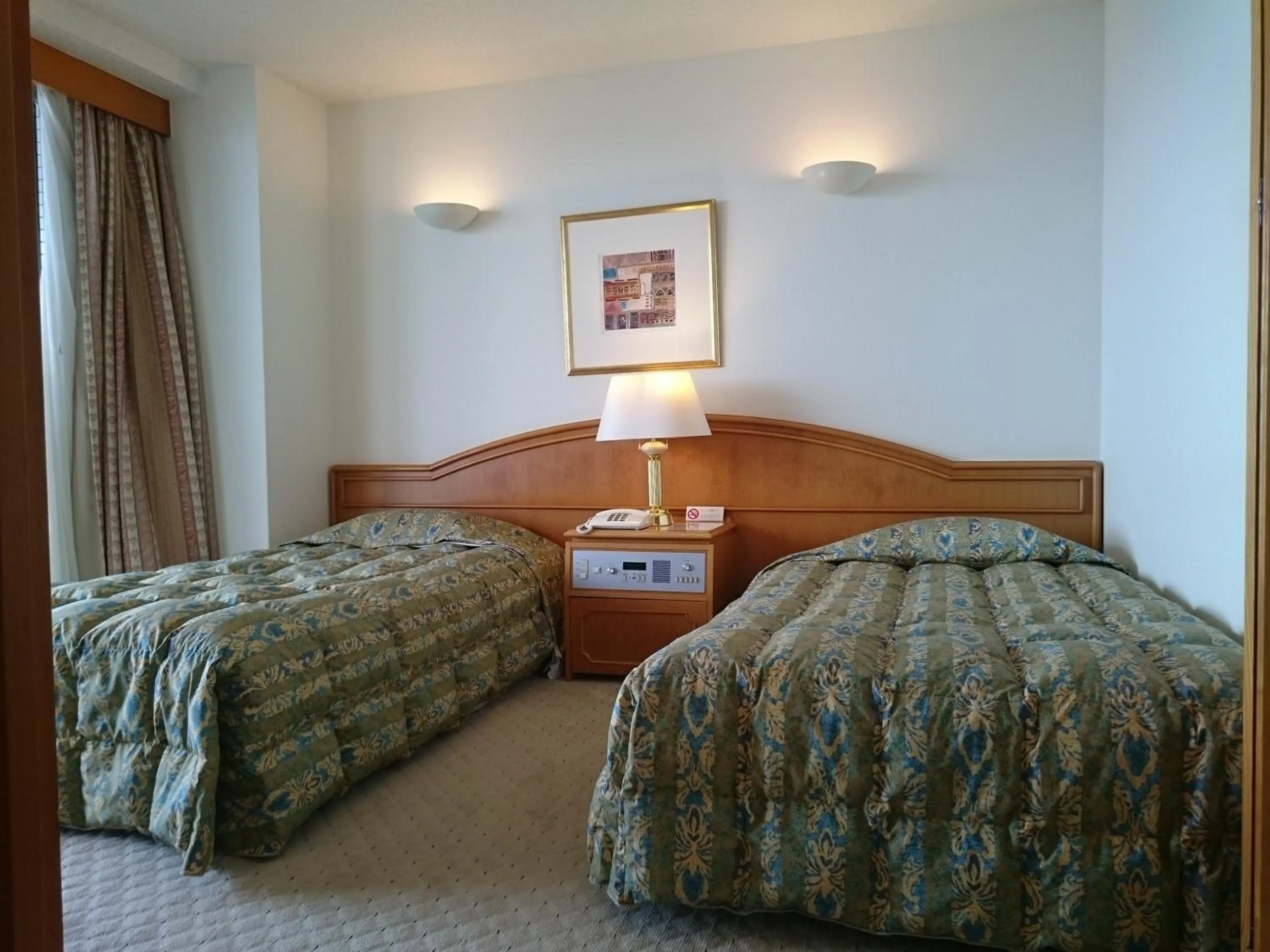 Bed in The Gran Resort Elegante Awajishima