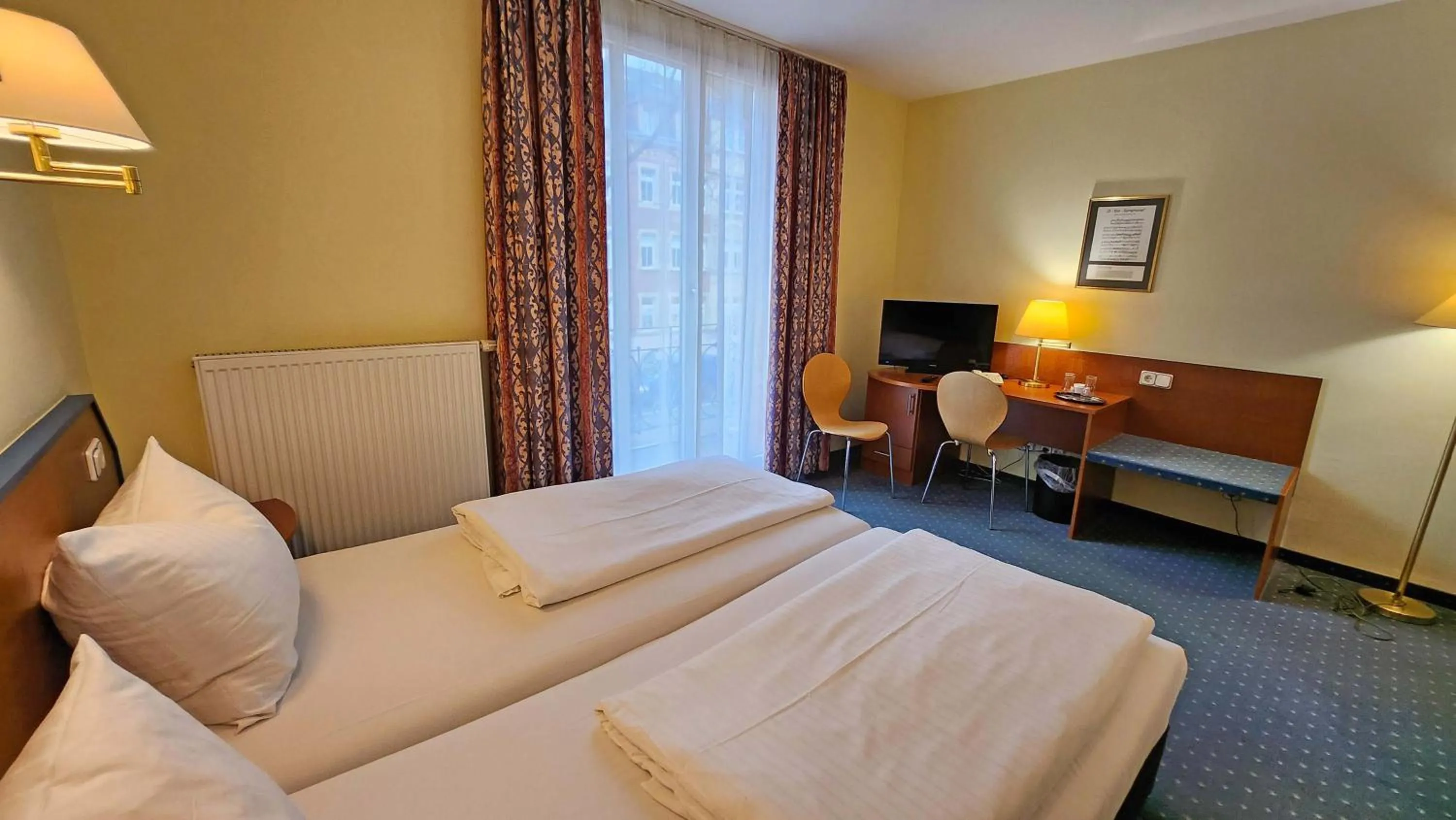 Photo of the whole room, Bed in Hotel Amadeus Dresden Neustadt