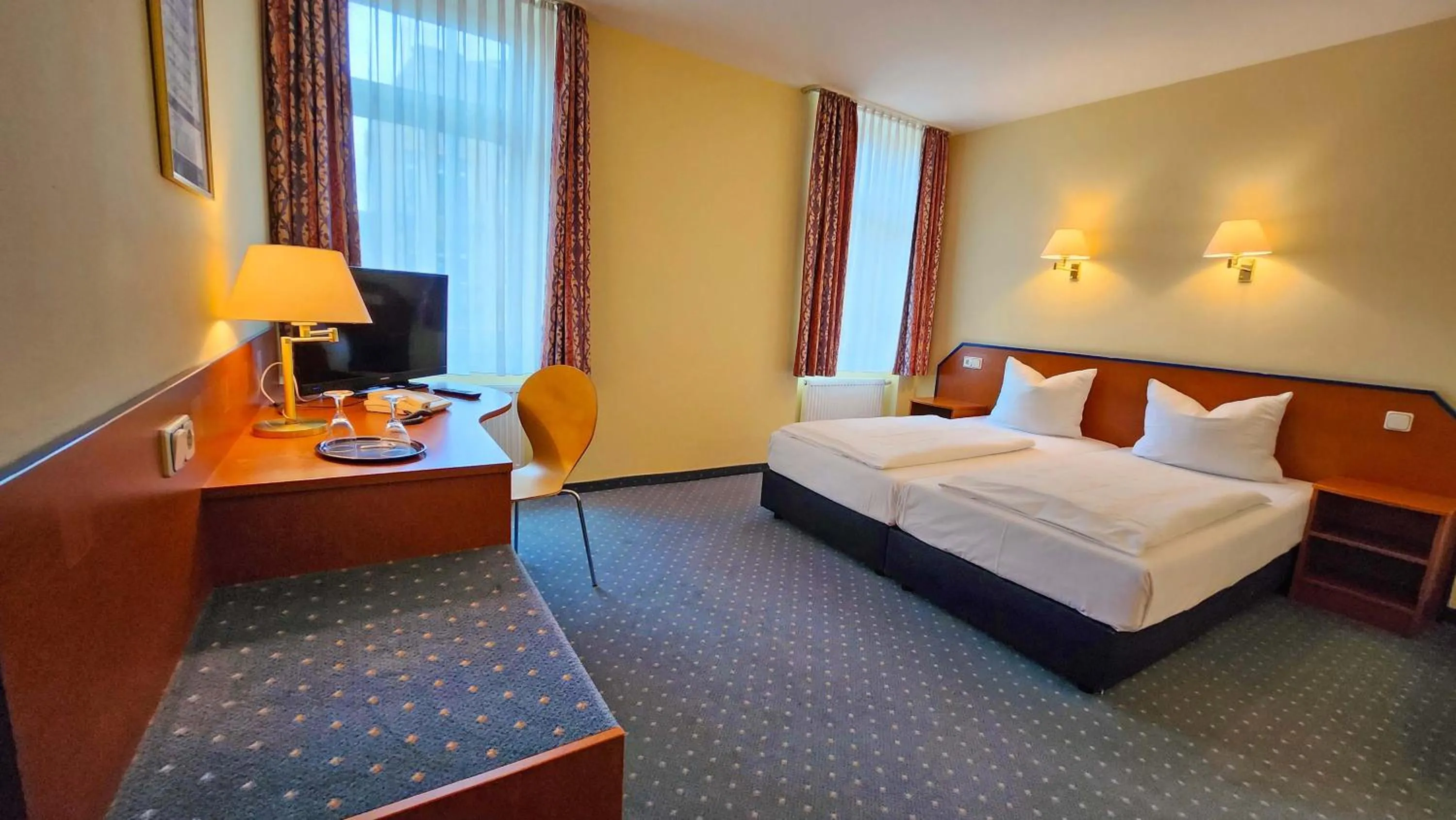 Photo of the whole room, Bed in Hotel Amadeus Dresden Neustadt