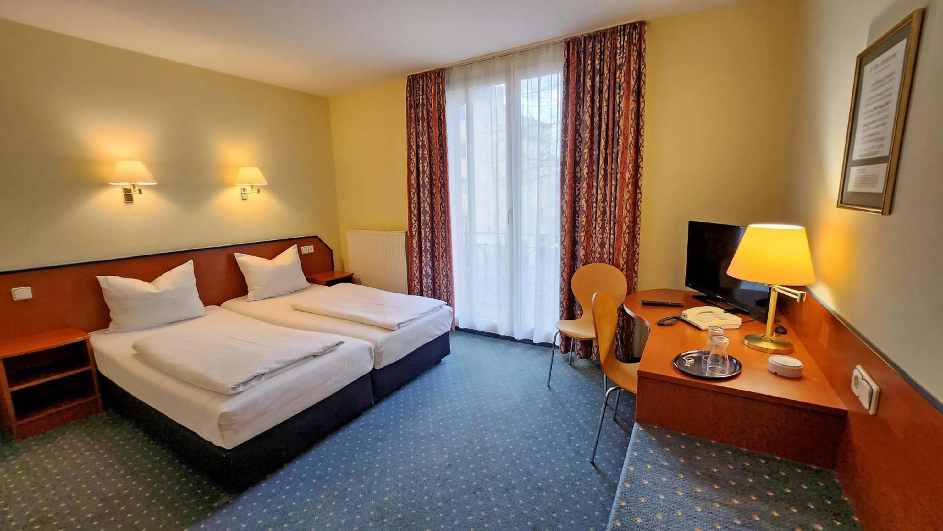 Photo of the whole room, Bed in Hotel Amadeus Dresden Neustadt