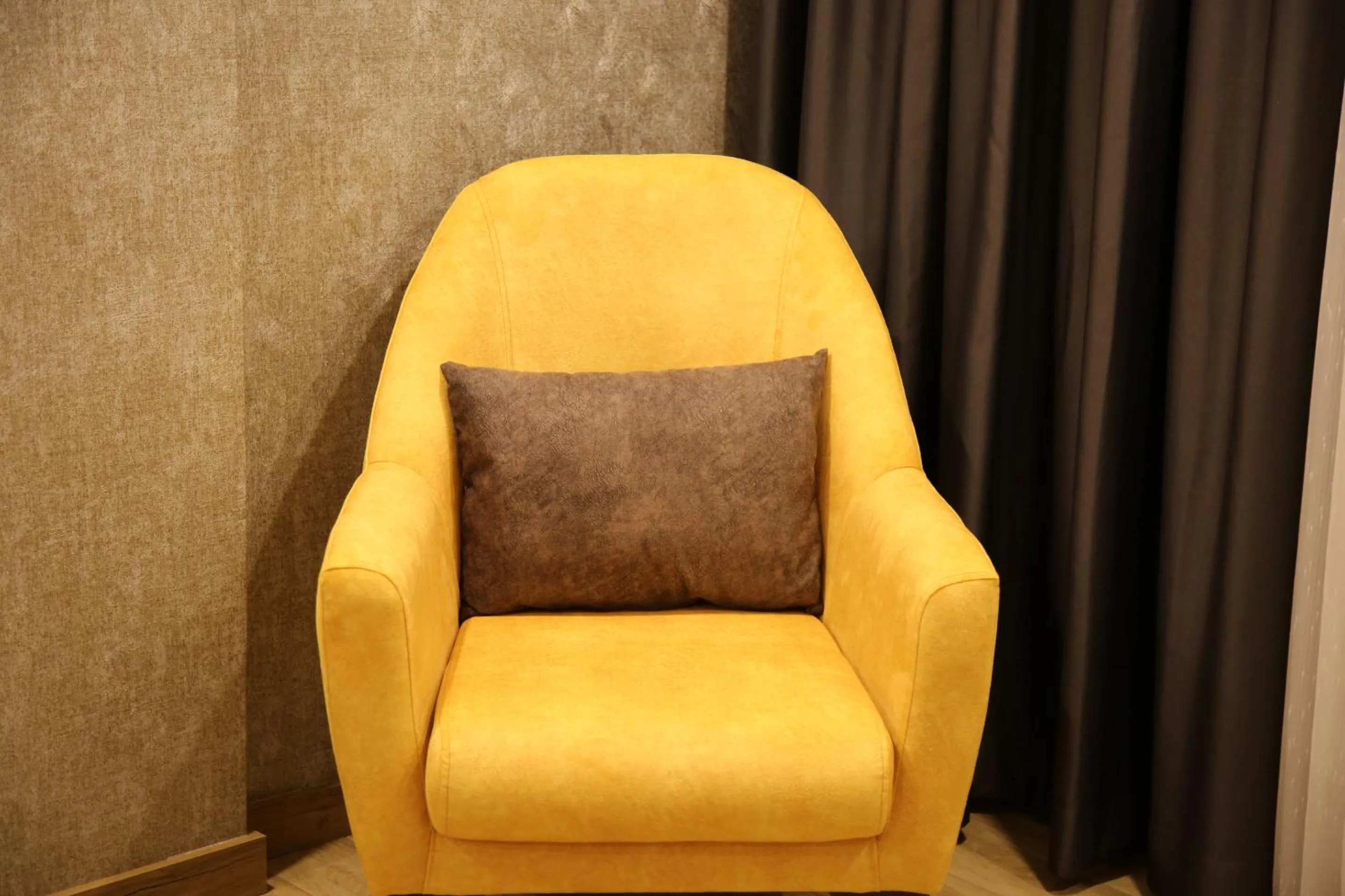 Living room in Golden World Suite Hotel