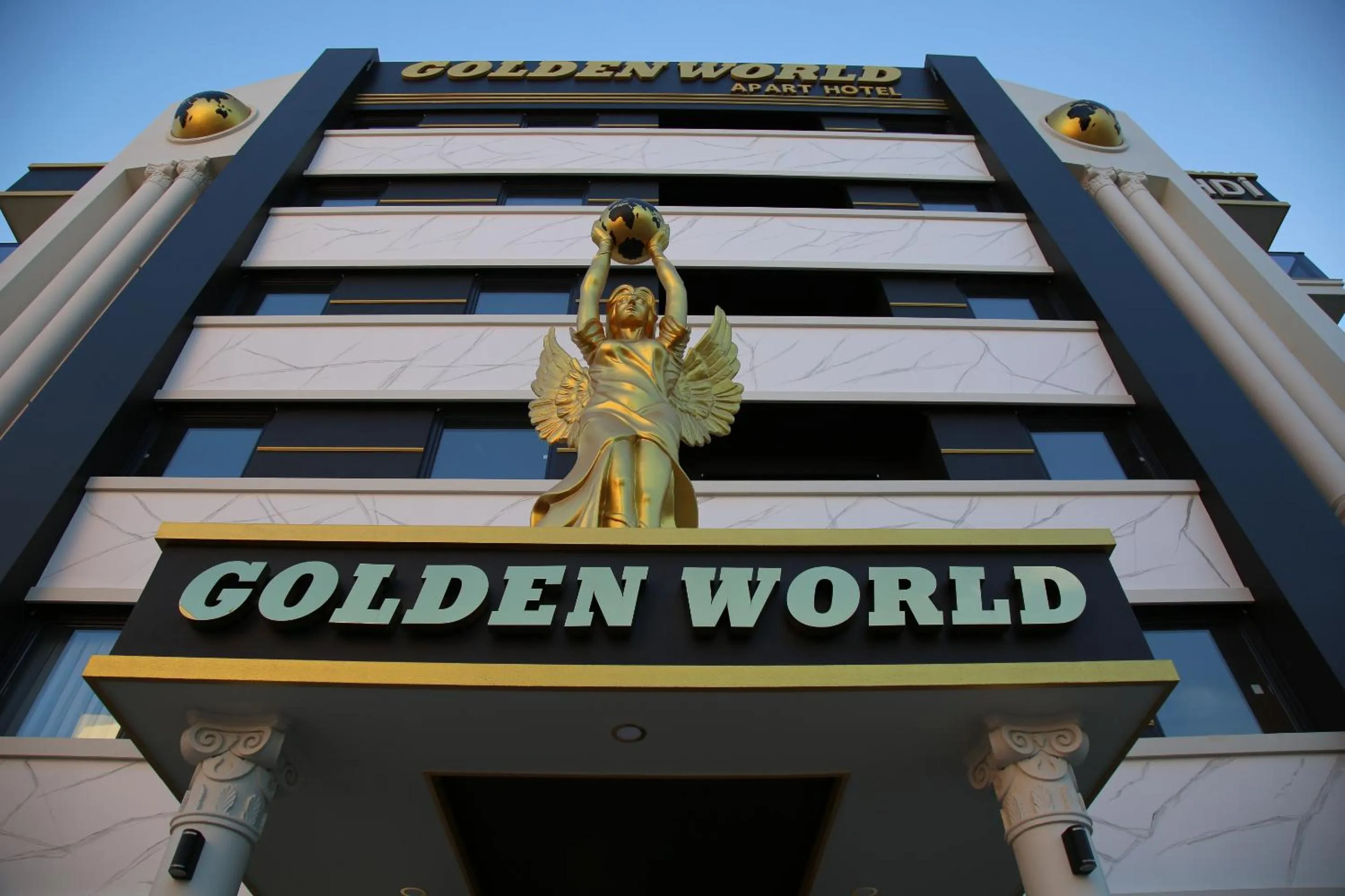 Property building in Golden World Suite Hotel