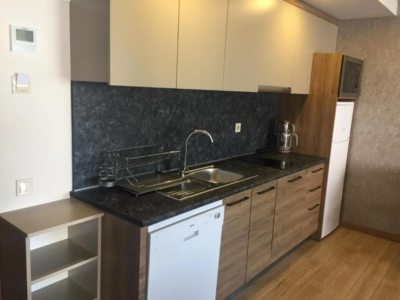 Kitchen or kitchenette in Golden World Suite Hotel