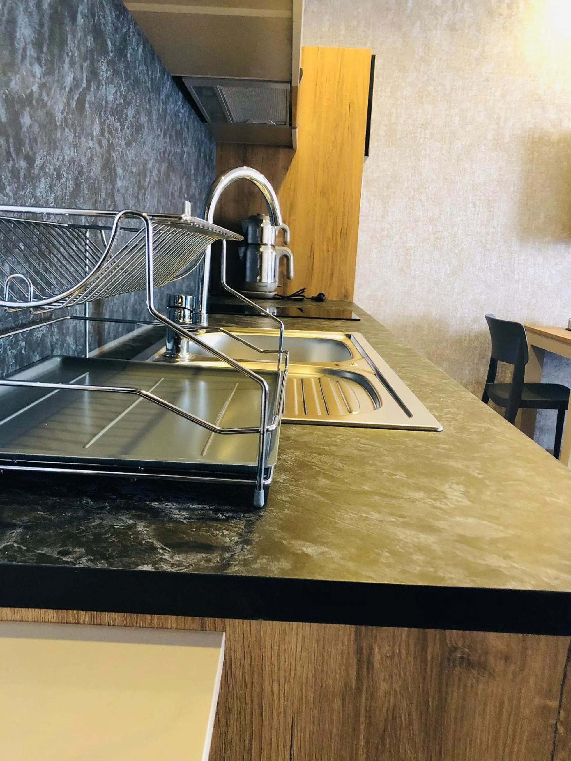 kitchen in Golden World Suite Hotel