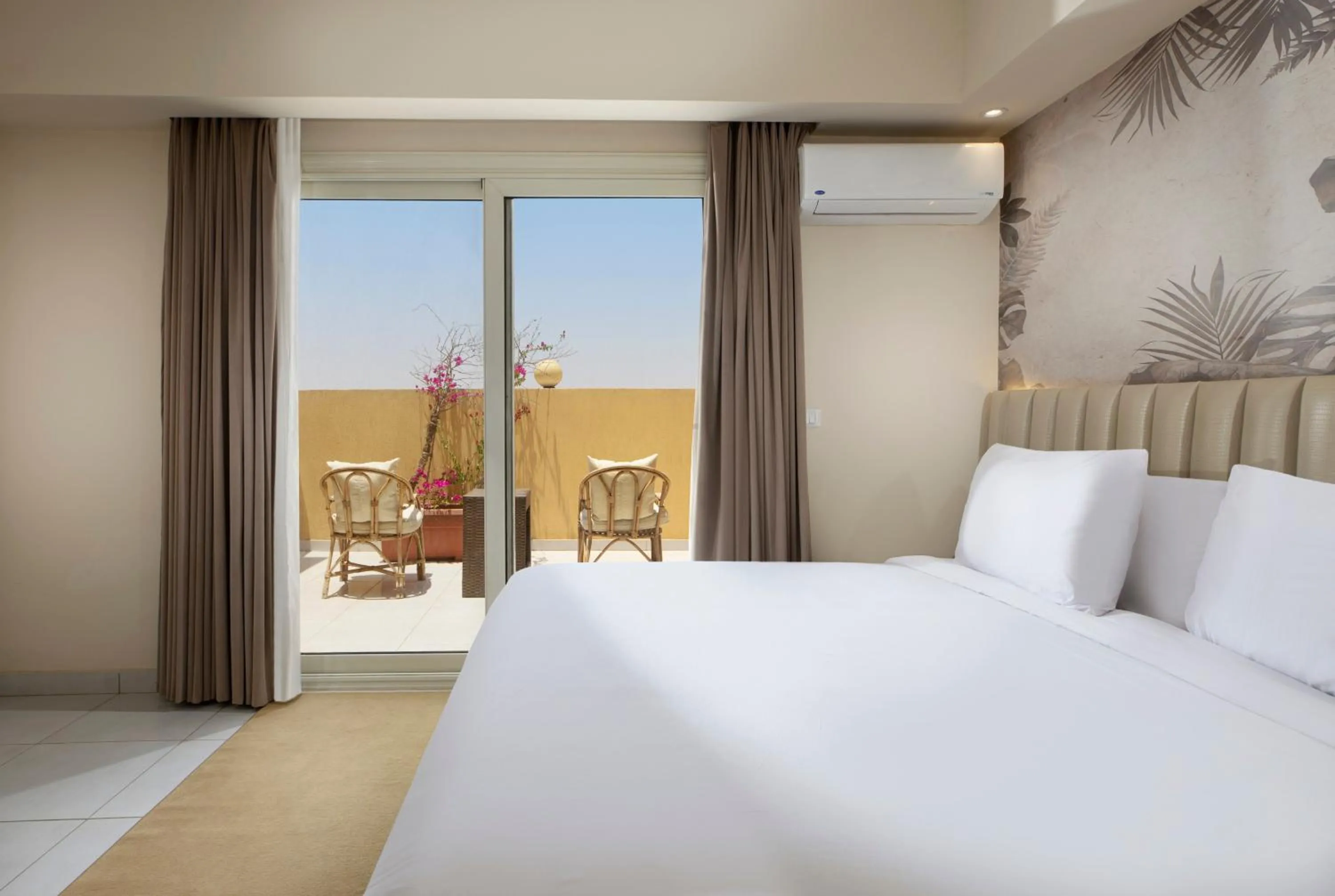 Bed in Vibotel Residence Hotel Apartments