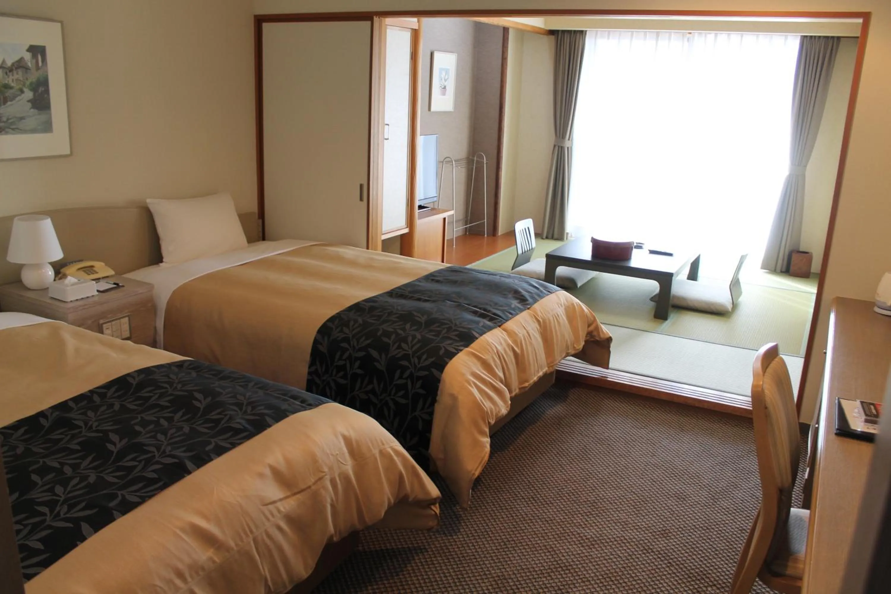 Bed in The Gran Resort Princess Arima