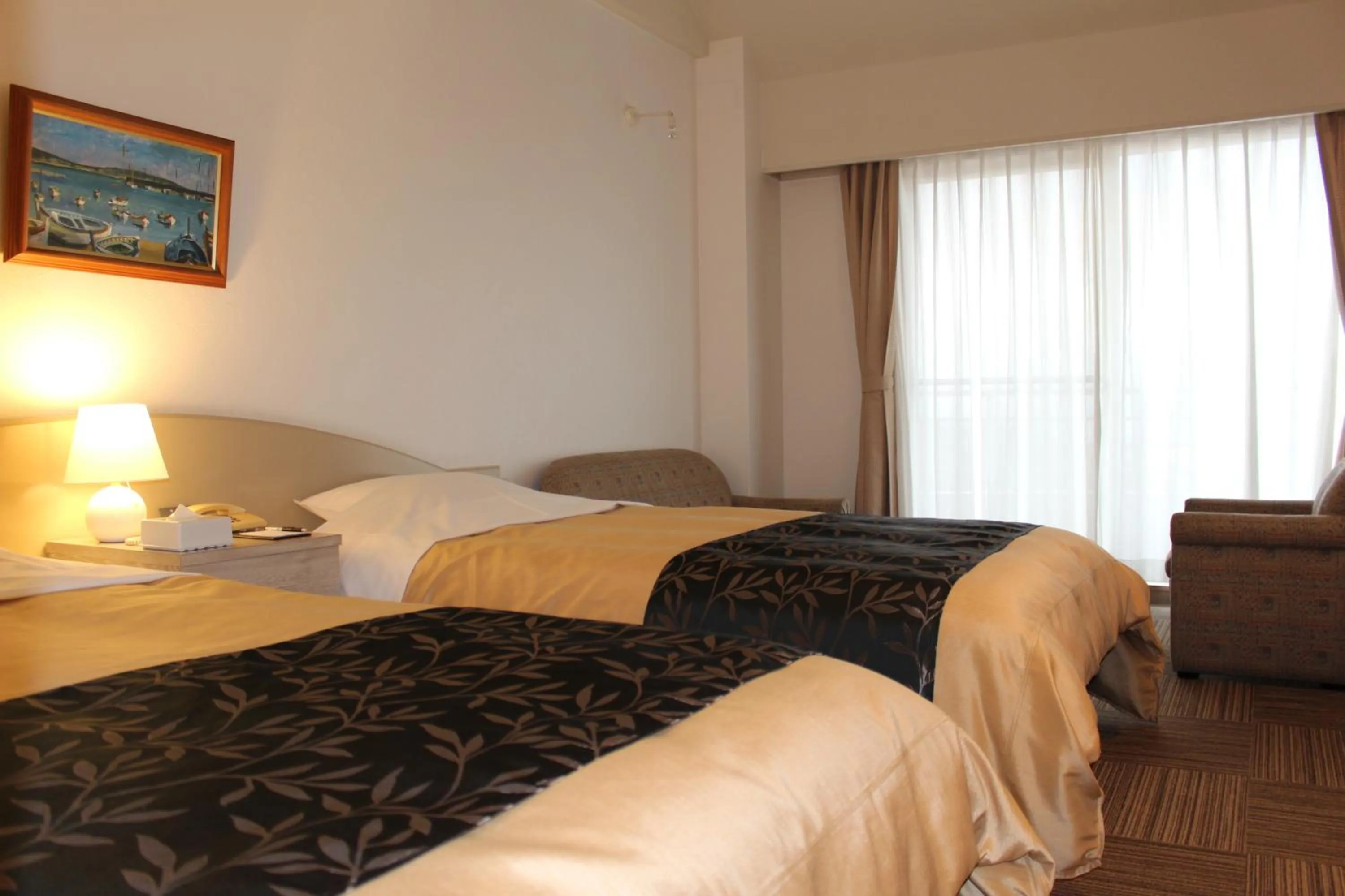 Bed in The Gran Resort Princess Arima