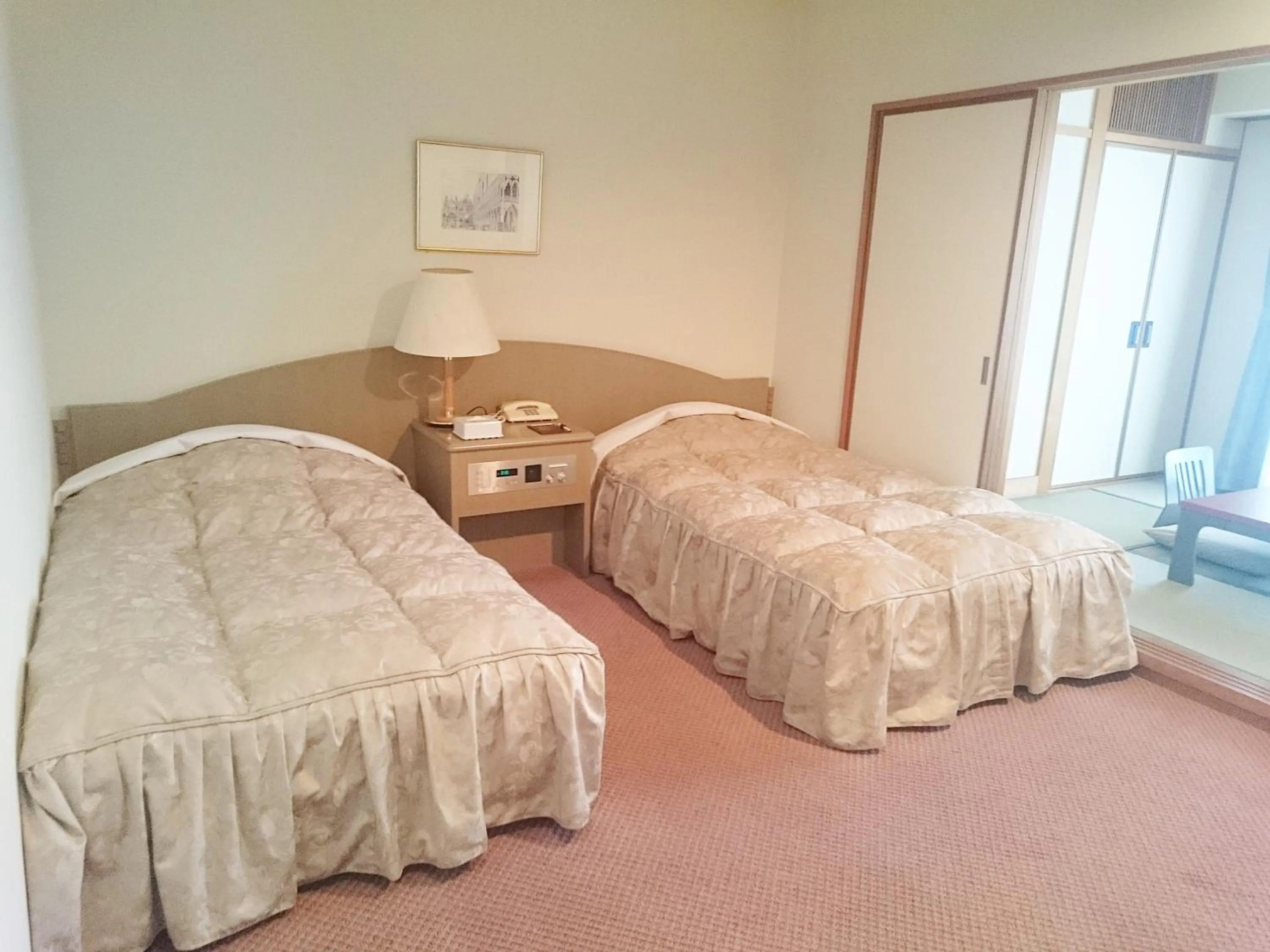 Bed in The Gran Resort Princess Arima