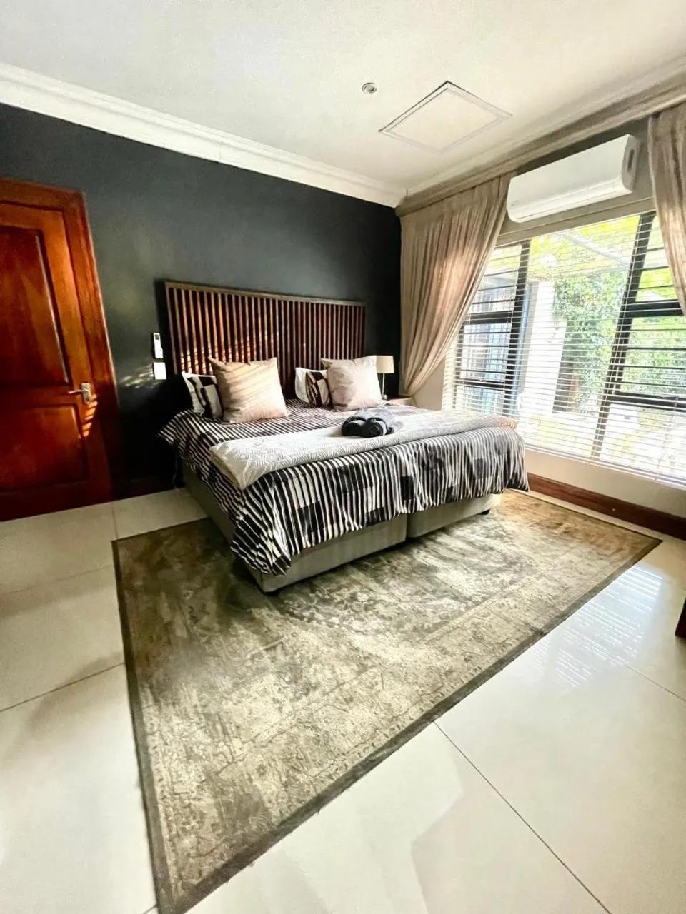 Seating area, Bed in Potch Manor Guest House