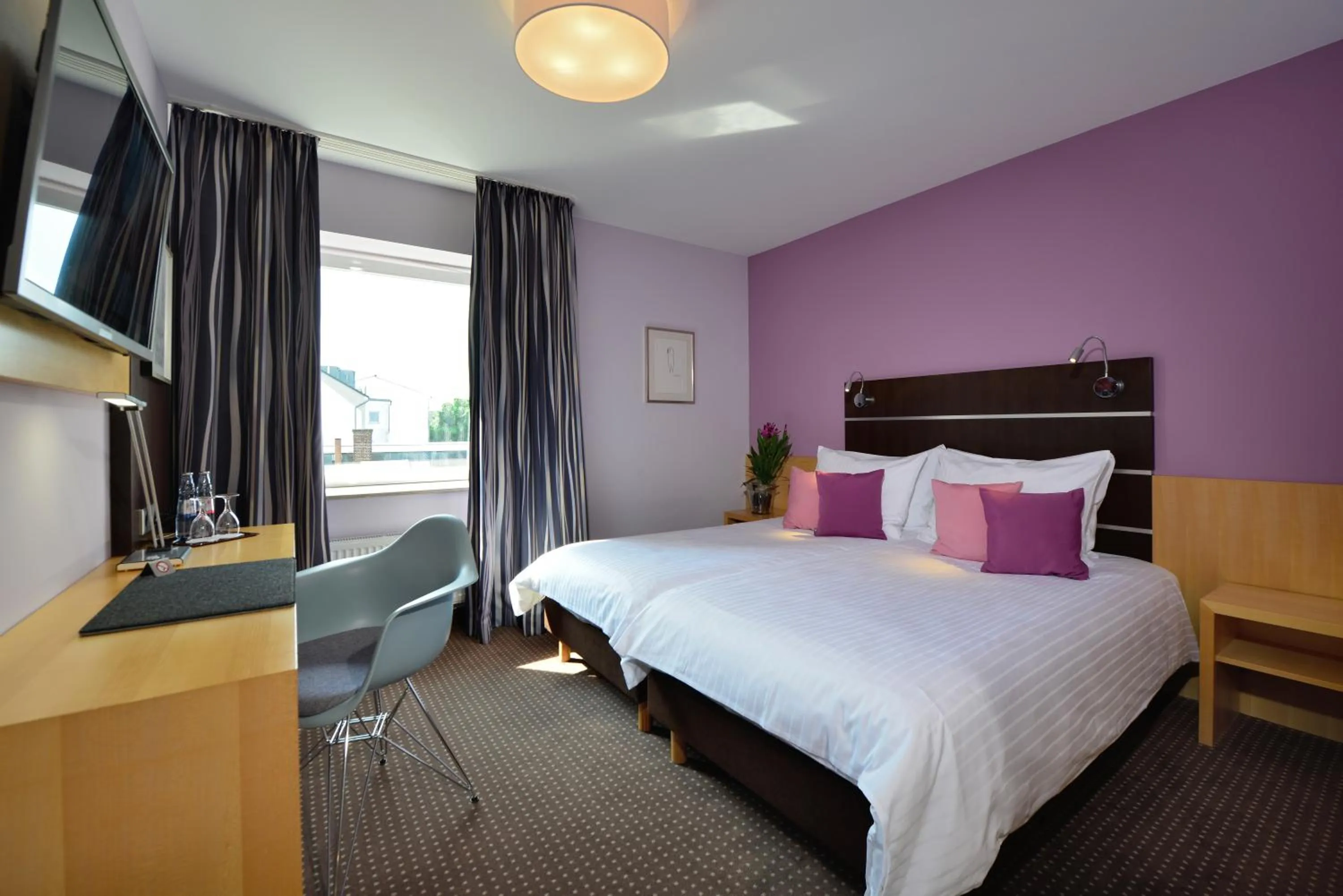 Photo of the whole room, Bed in Hotel Uhu Garni - Superior