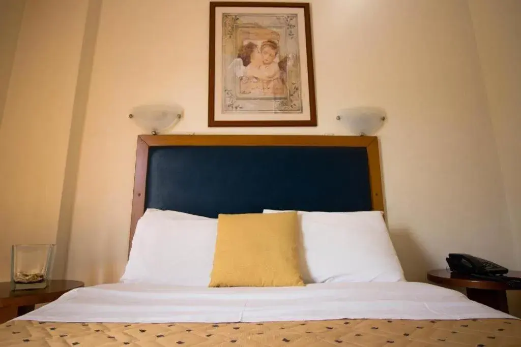 Bed in Adams Hotel Bed in Adams Hotel